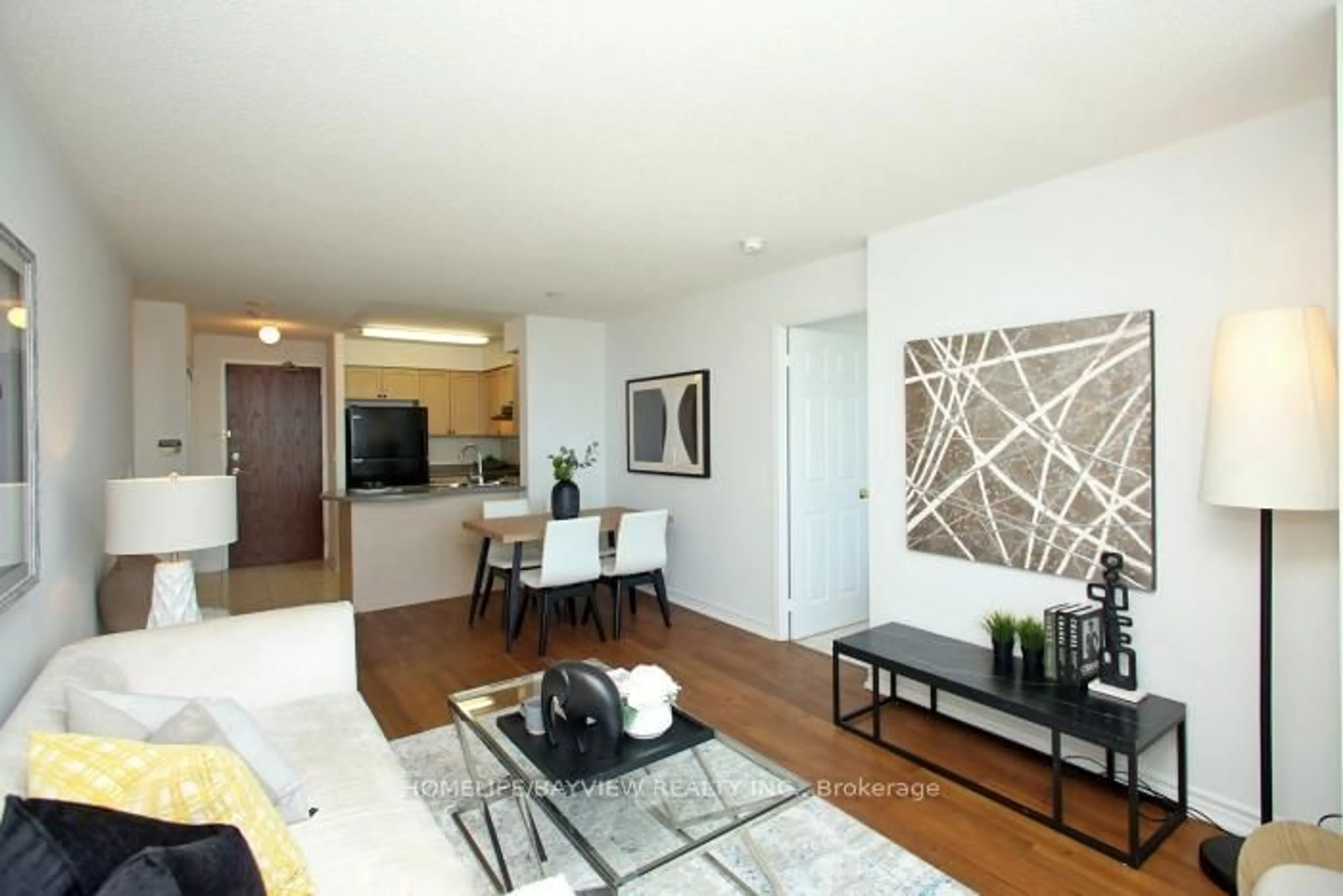 Living room with furniture, wood/laminate floor for 23 Oneida Cres #PH12, Richmond Hill Ontario L4B 0A2