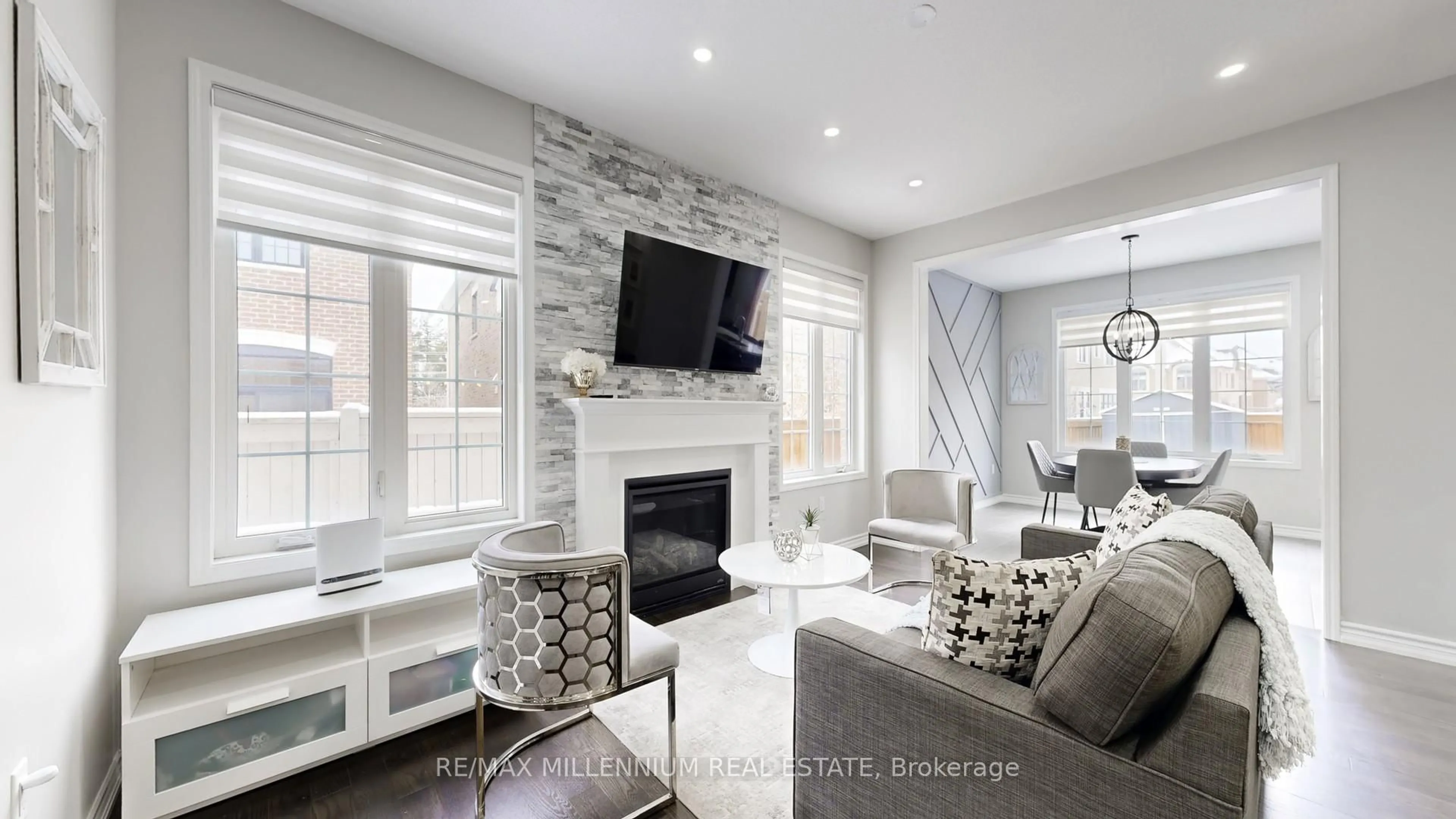 Living room with furniture, ceramic/tile floor for 35 Barn Owl Way, Vaughan Ontario L4H 4S9