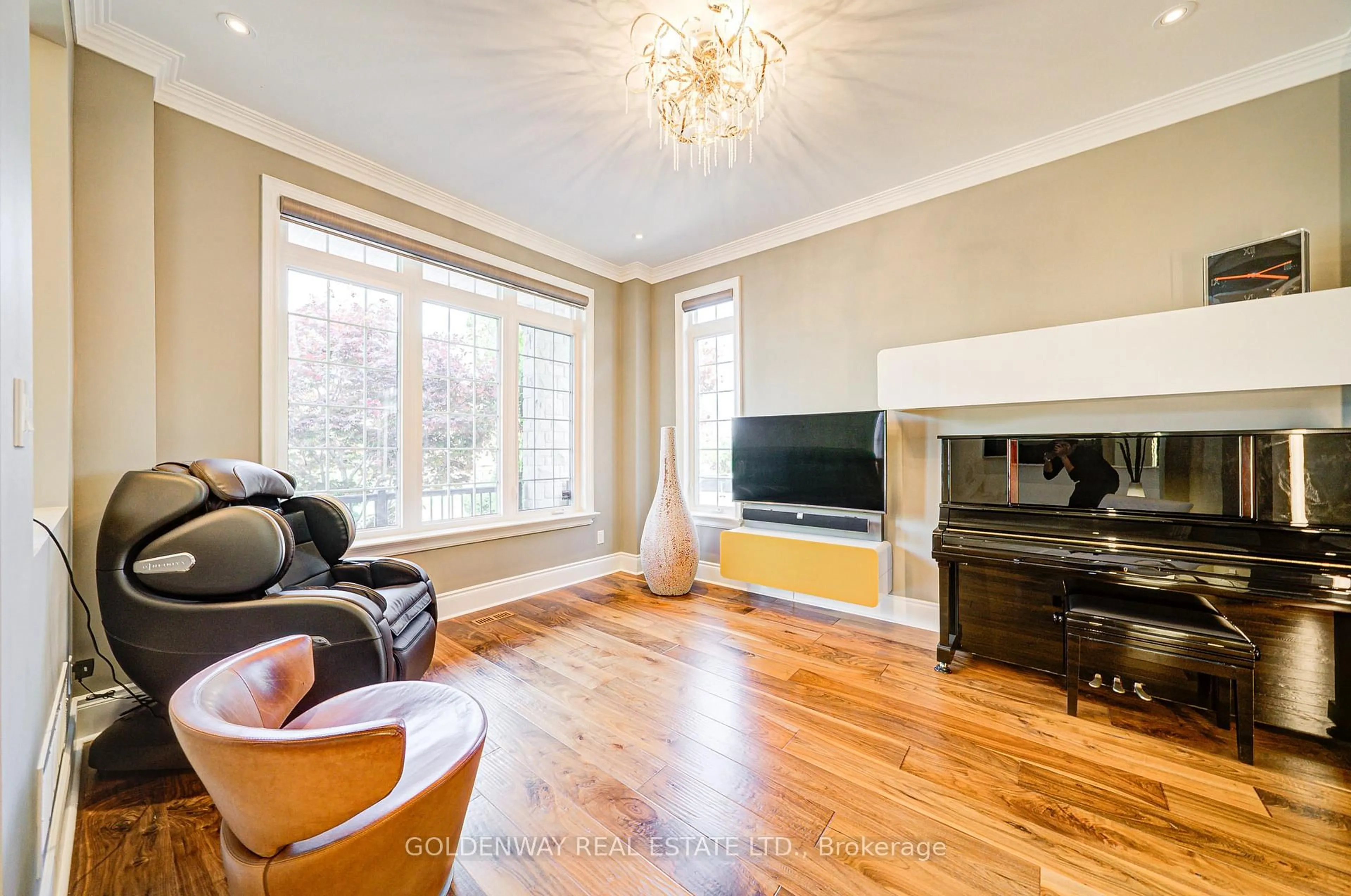 Living room with furniture, wood/laminate floor for 229 Hunterwood Chse, Vaughan Ontario L6A 4R2