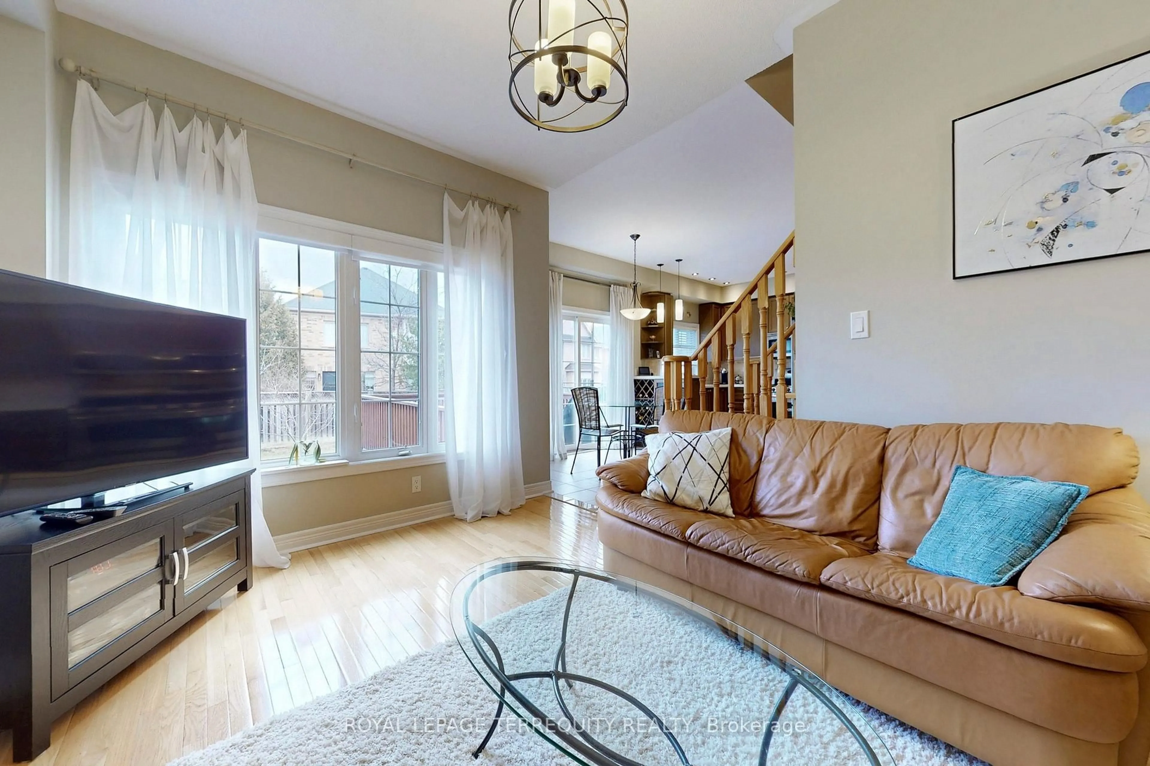 Living room with furniture, wood/laminate floor for 51 Donzi Lane, Vaughan Ontario L6A 0G8