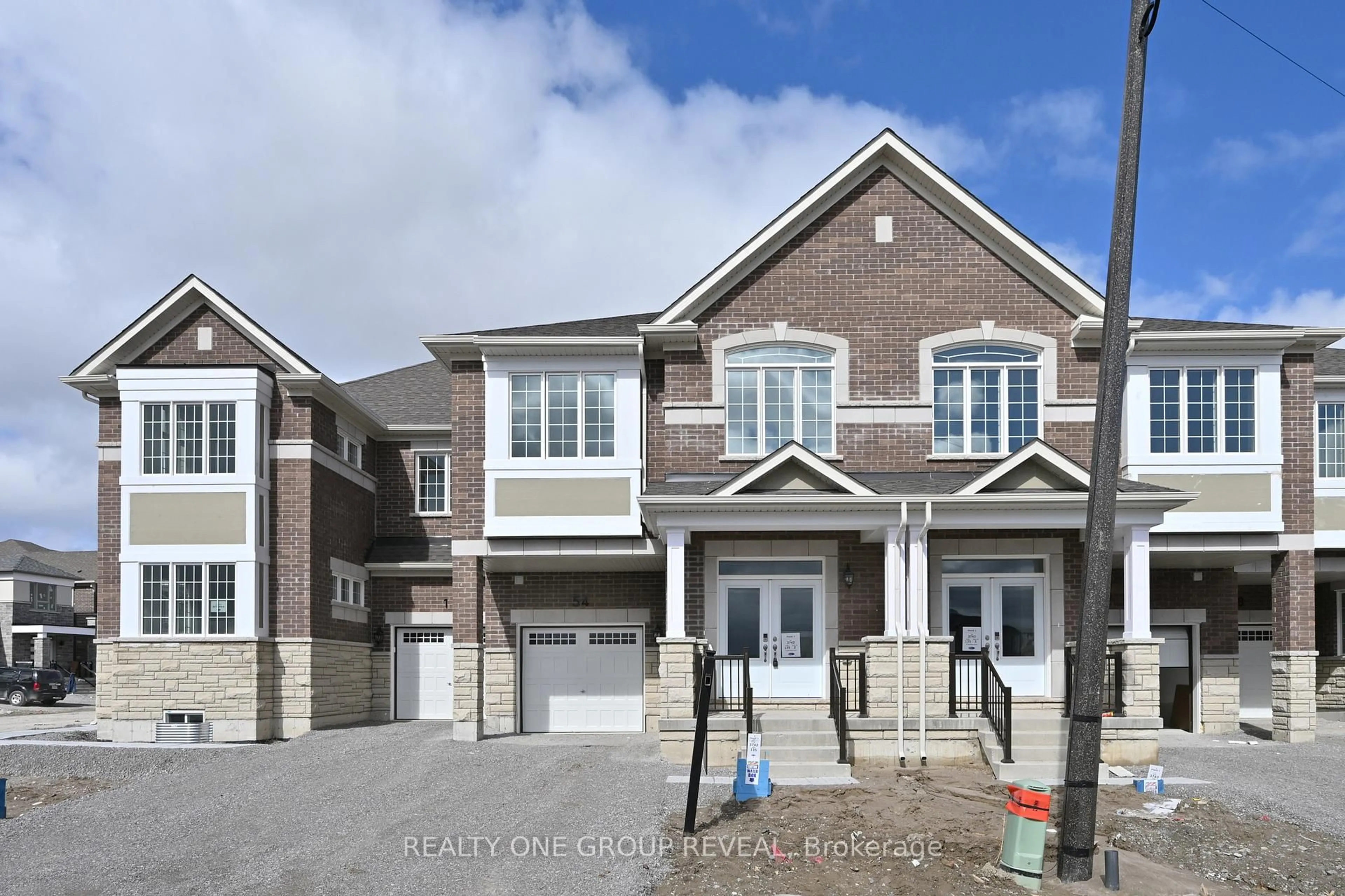 Home with brick exterior material, street for 54 Jade Blossom Ave, Markham Ontario L6C 3P7