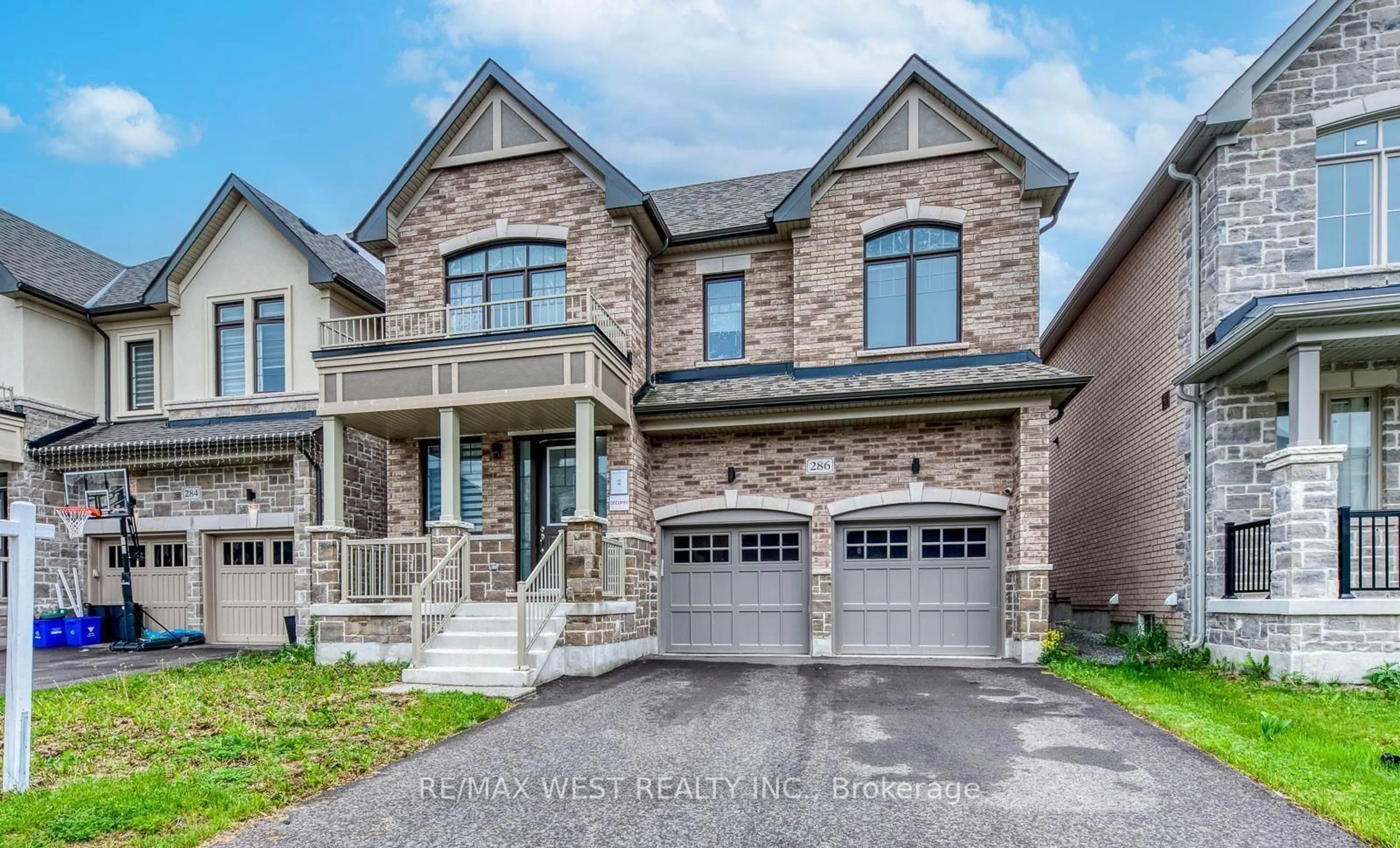 Home with brick exterior material, street for 286 Danny Wheeler Blvd, Georgina Ontario L4P 0J9