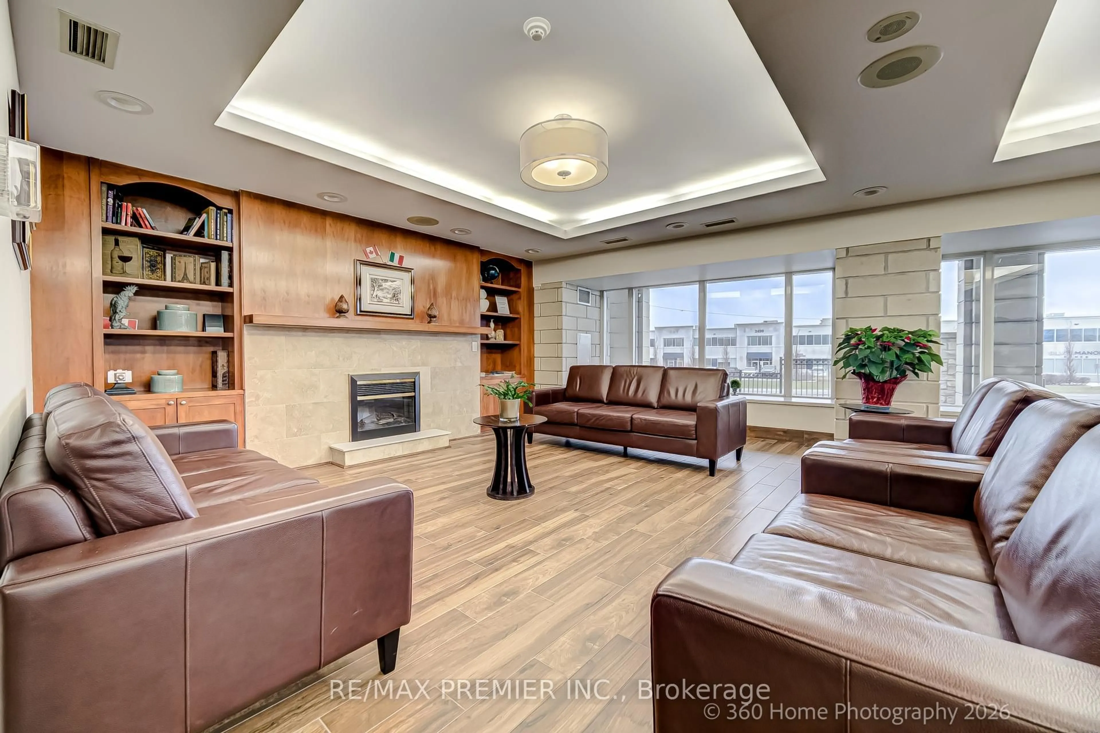 Living room with furniture, wood/laminate floor for 2500 Rutherford Rd #311, Vaughan Ontario L4K 2N8