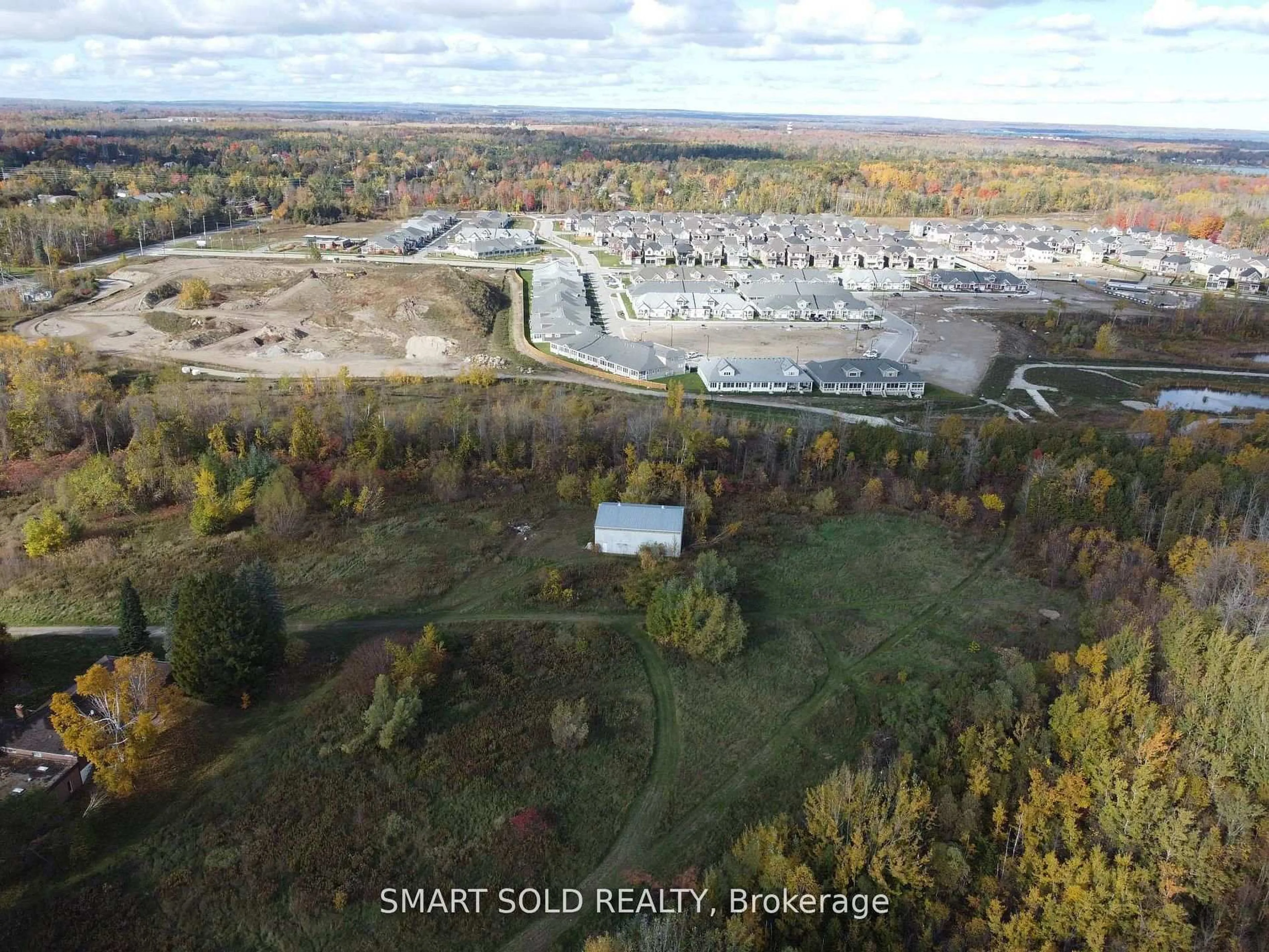 A pic from outside/outdoor area/front of a property/back of a property/a pic from drone, water/lake/river/ocean view for 2849 Clarkesville St, Innisfil Ontario L9S 2J1