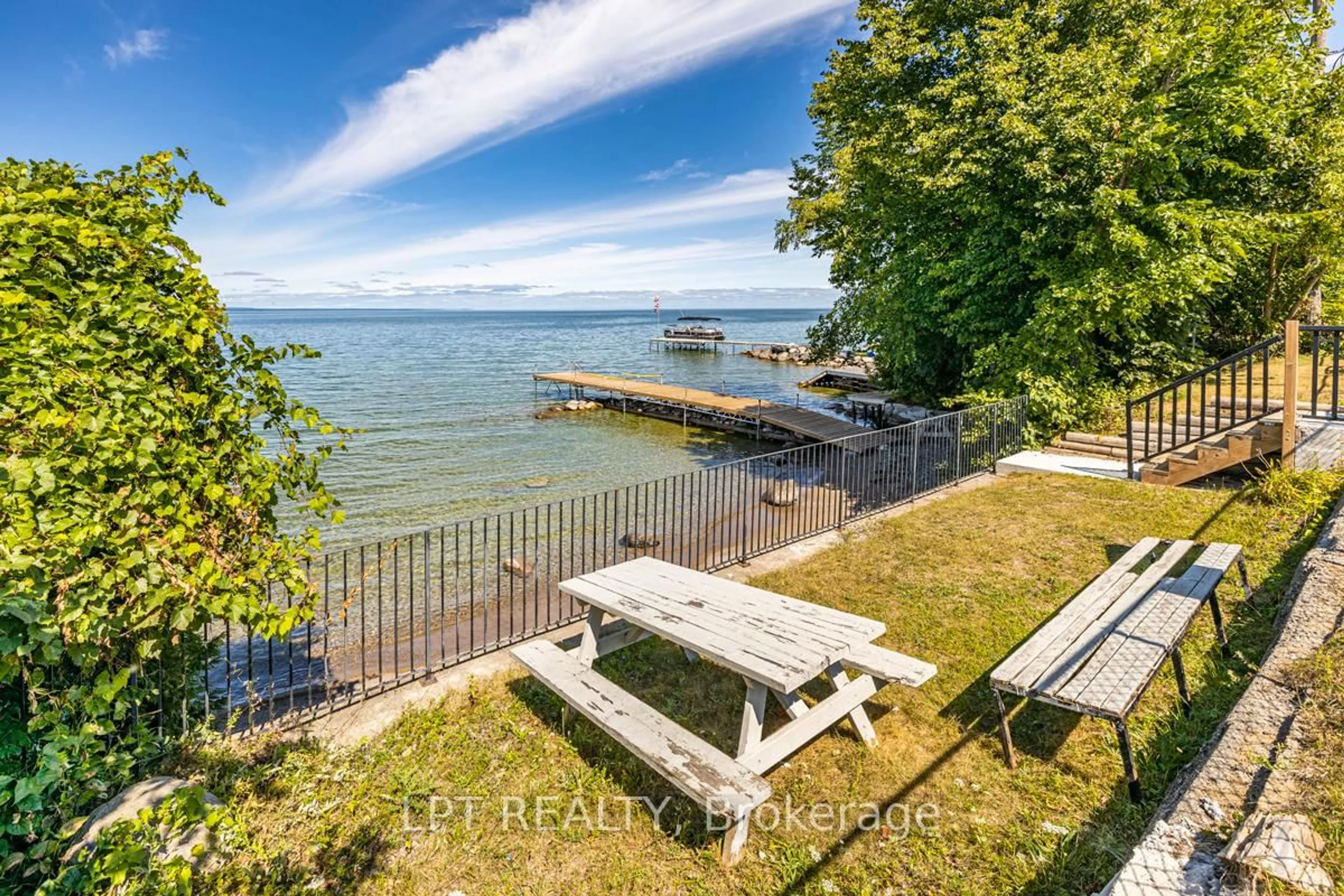 A pic from outside/outdoor area/front of a property/back of a property/a pic from drone, water/lake/river/ocean view for 808 Montsell Ave, Georgina Ontario L0E 1S0