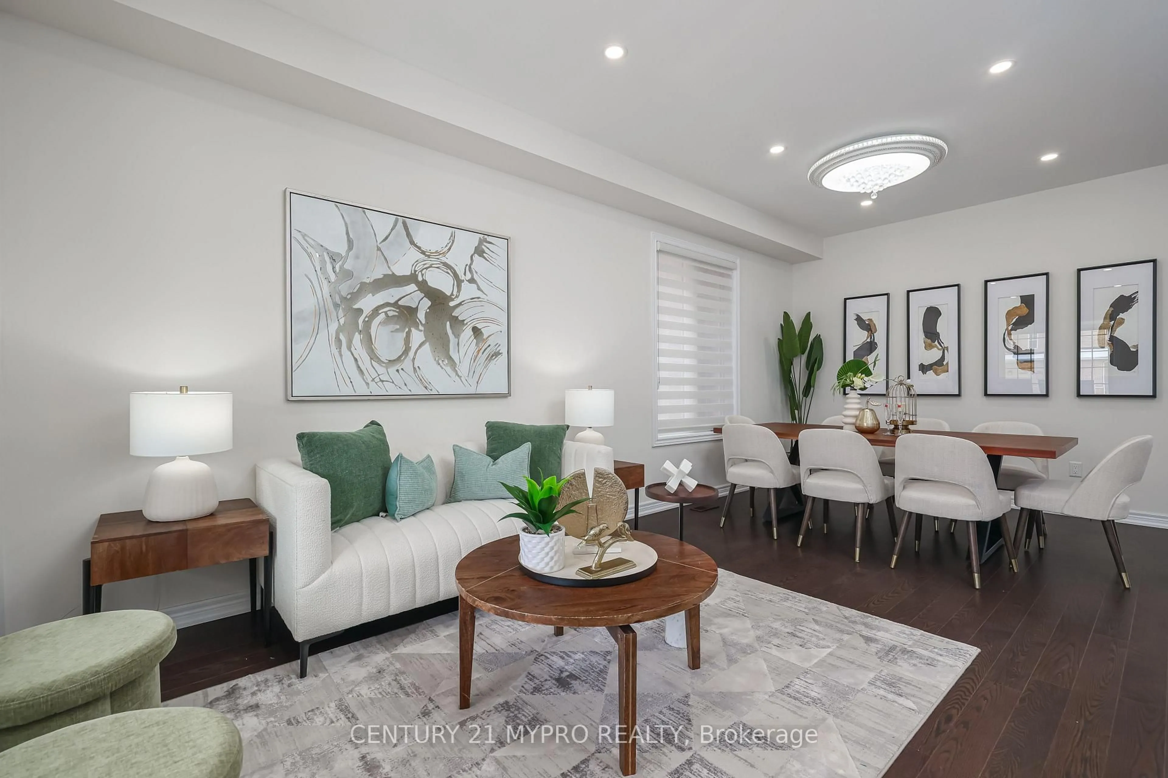 Living room with furniture, wood/laminate floor for 72 Belfry Dr, Bradford West Gwillimbury Ontario L3Z 0V6