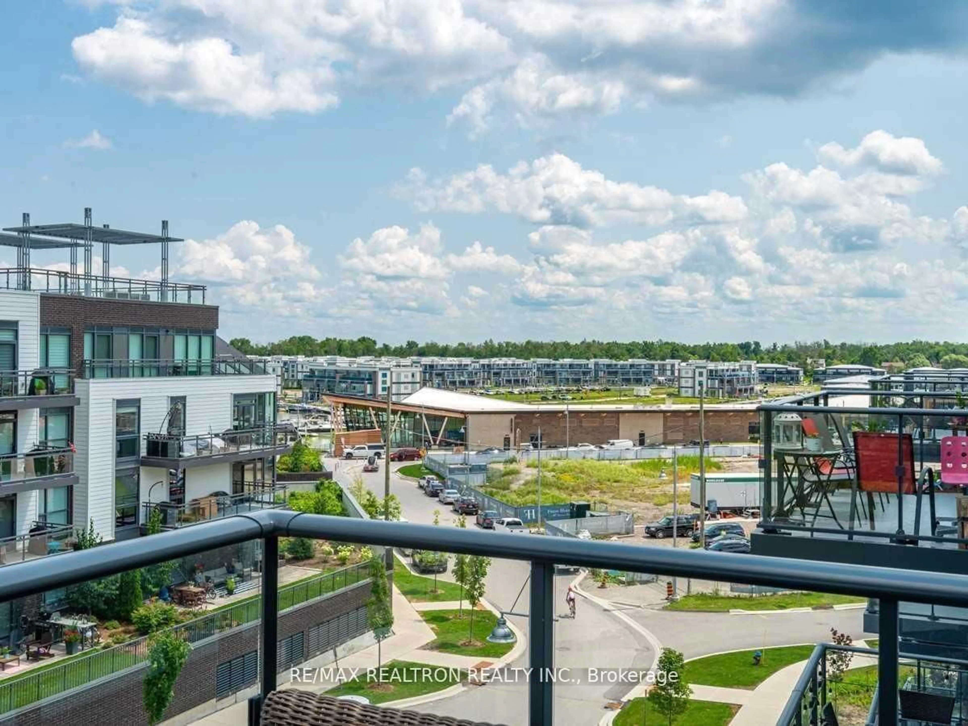 Balcony in the apartment, city buildings view from balcony for 375 Sea Ray Ave #413, Innisfil Ontario L9S 0J4