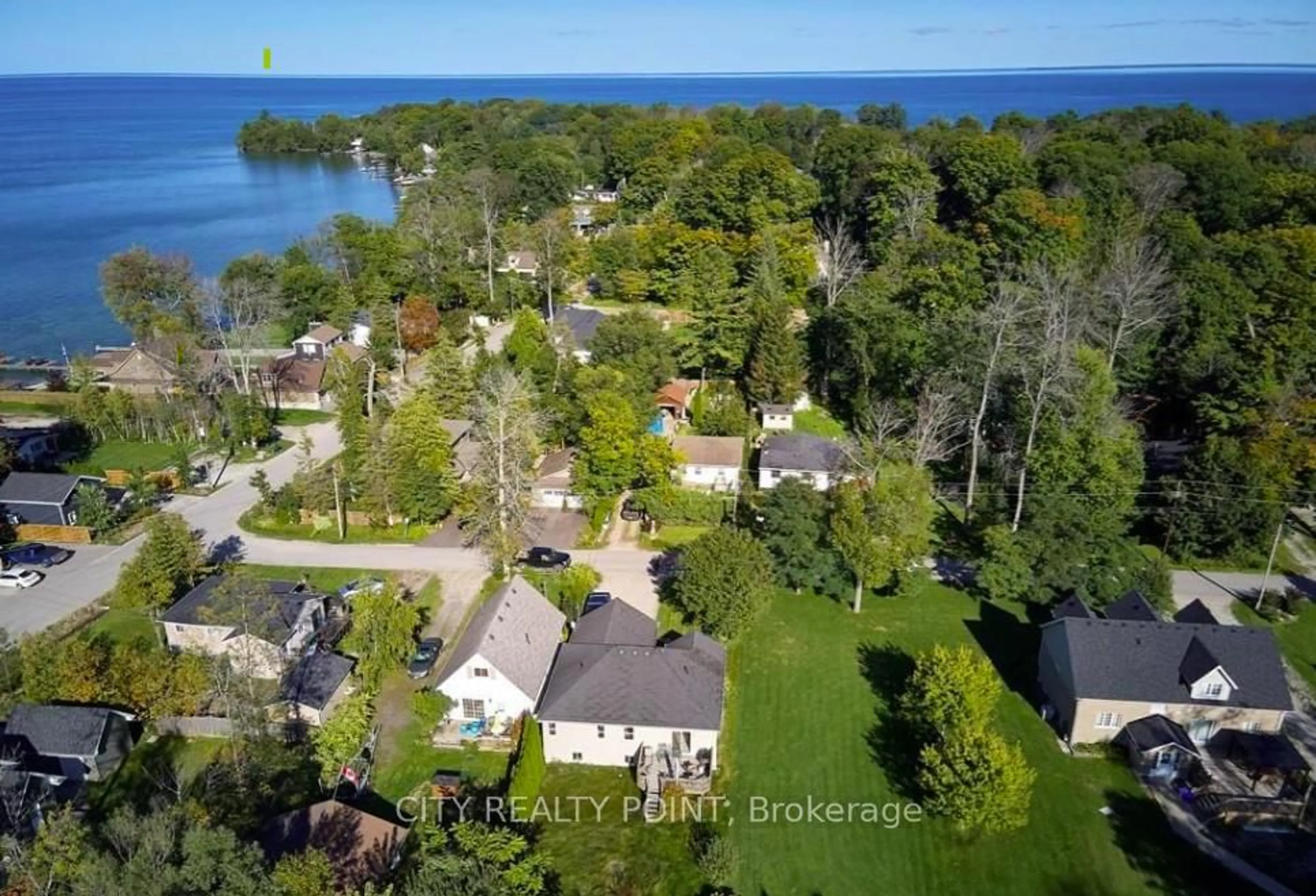 A pic from outside/outdoor area/front of a property/back of a property/a pic from drone, water/lake/river/ocean view for 3964 Alcina Ave, Innisfil Ontario L9S 2M1