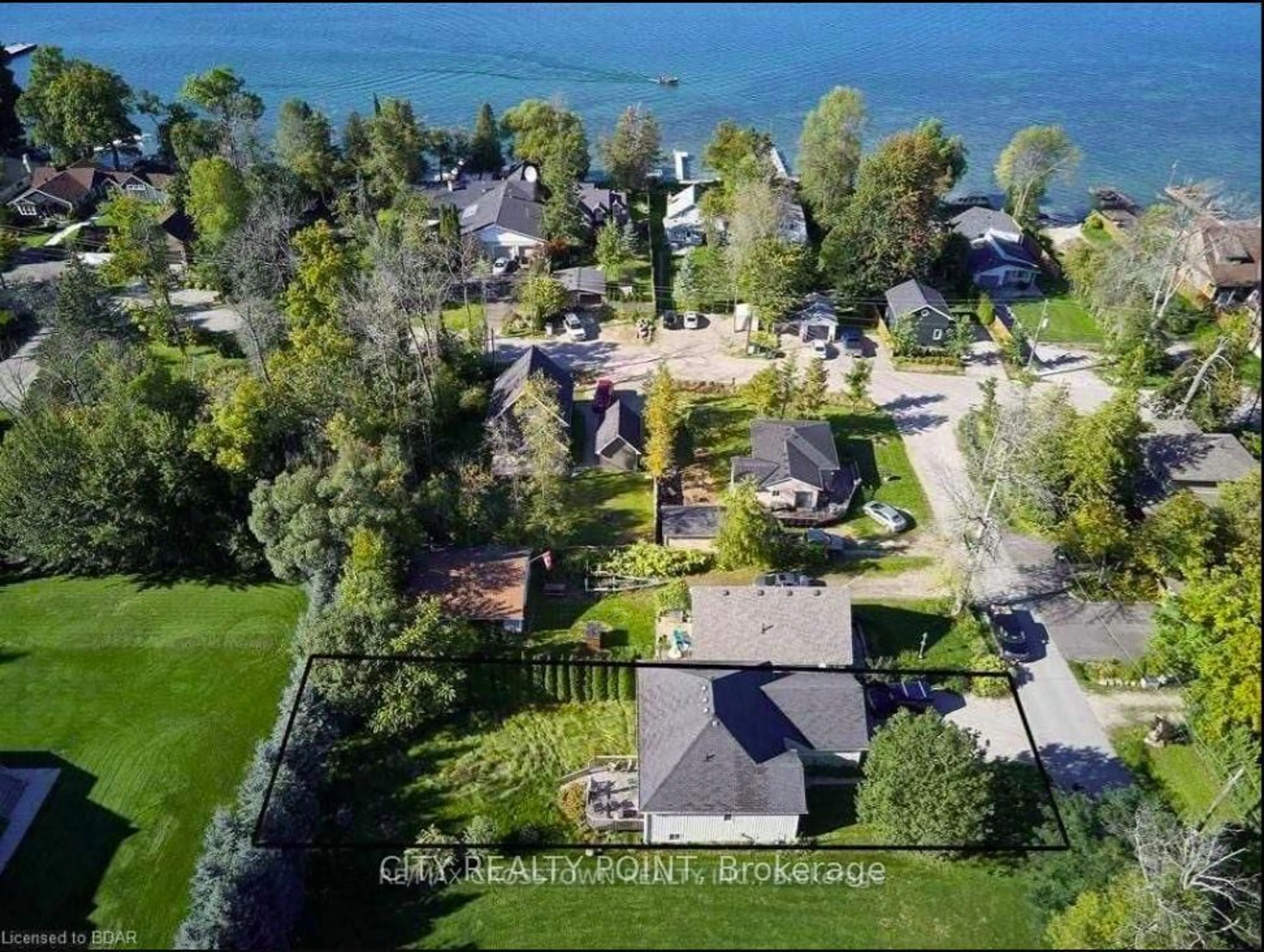 A pic from outside/outdoor area/front of a property/back of a property/a pic from drone, water/lake/river/ocean view for 3964 Alcina Ave, Innisfil Ontario L9S 2M1