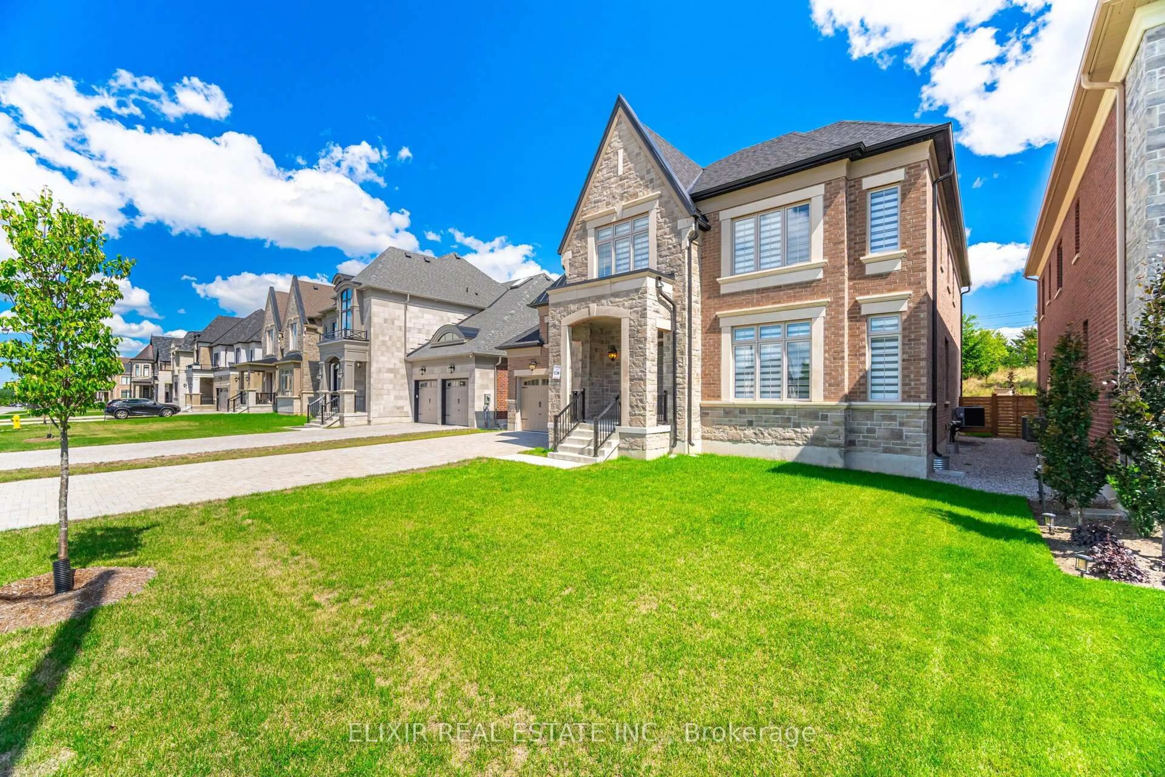 Home with brick exterior material, street for 33 Sculpture Garden Lane, Vaughan Ontario L4H 4P1