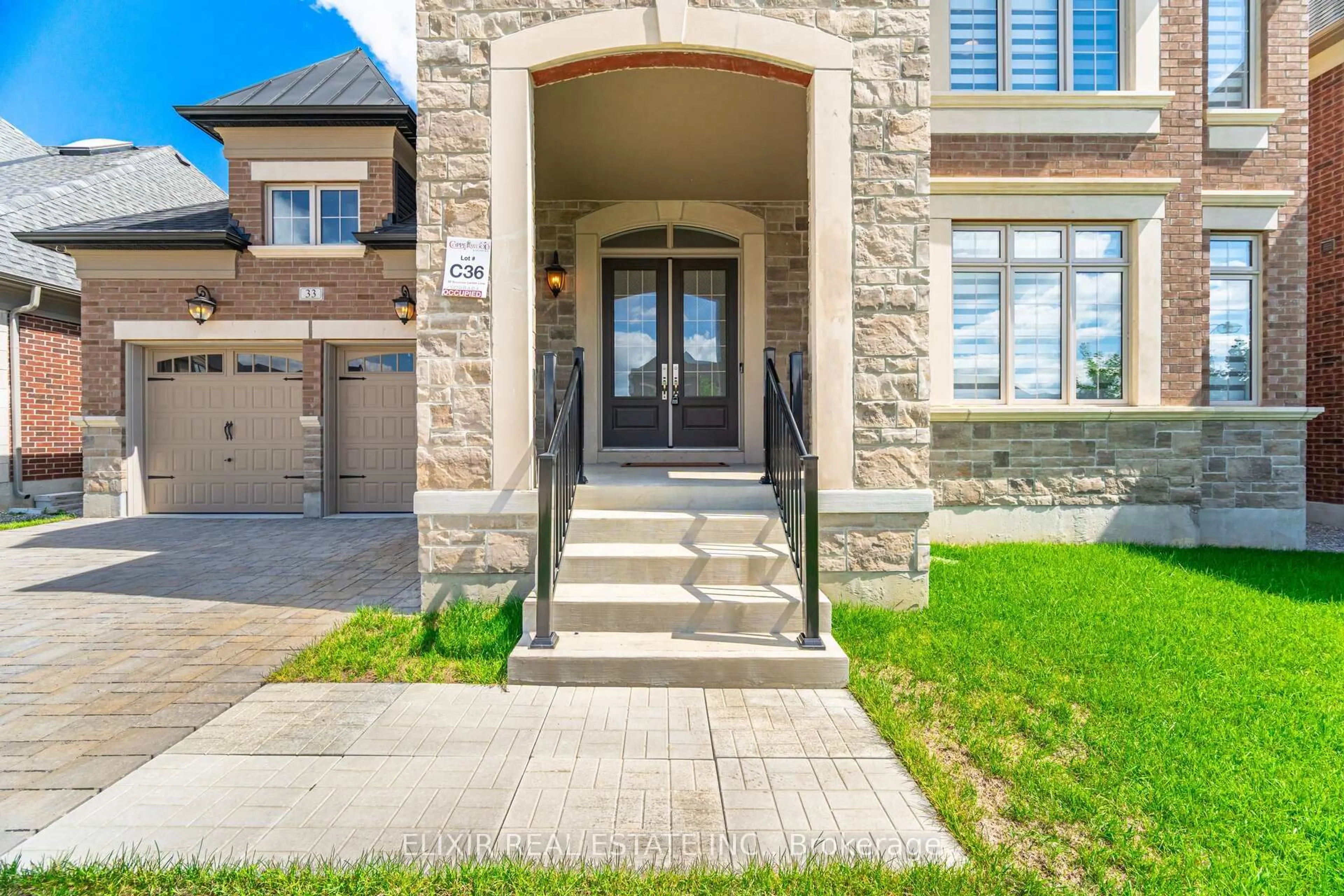 Home with brick exterior material, street for 33 Sculpture Garden Lane, Vaughan Ontario L4H 4P1