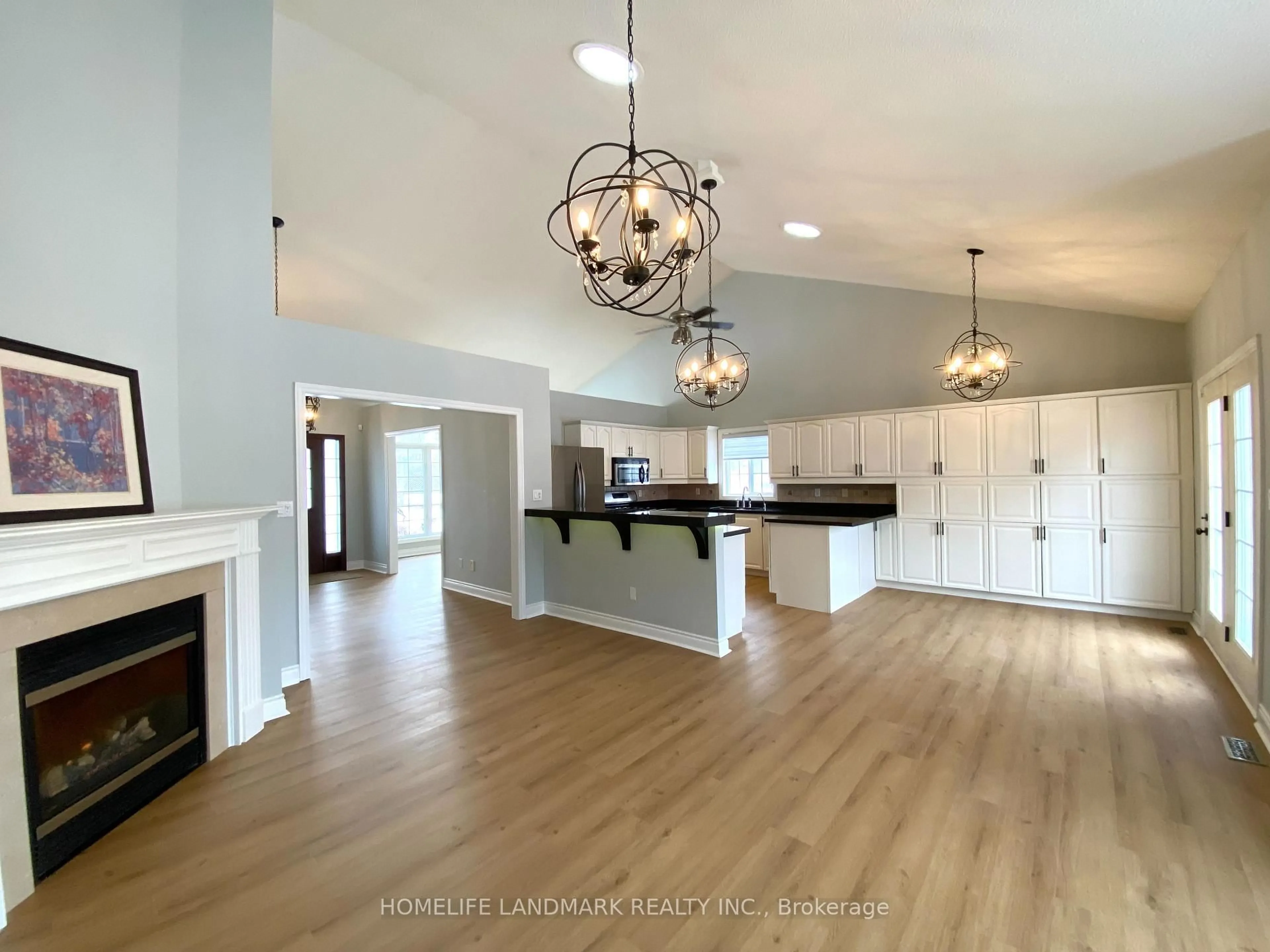 Open concept kitchen, wood/laminate floor for 1976 Forest Valley Dr, Innisfil Ontario L9S 4A5