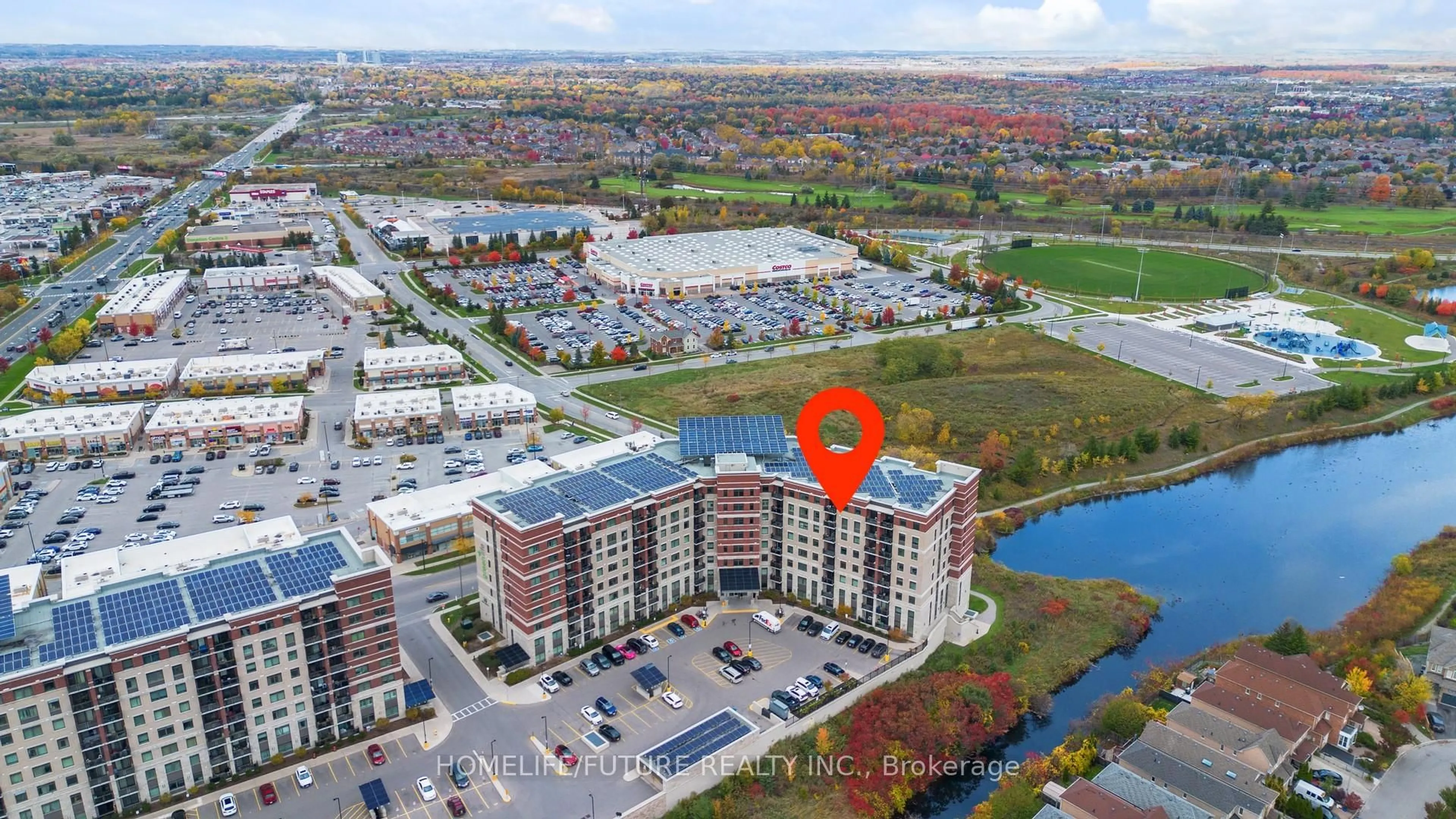 A pic from outside/outdoor area/front of a property/back of a property/a pic from drone, water/lake/river/ocean view for 39 New Delhi Dr #809, Markham Ontario L3S 0E1