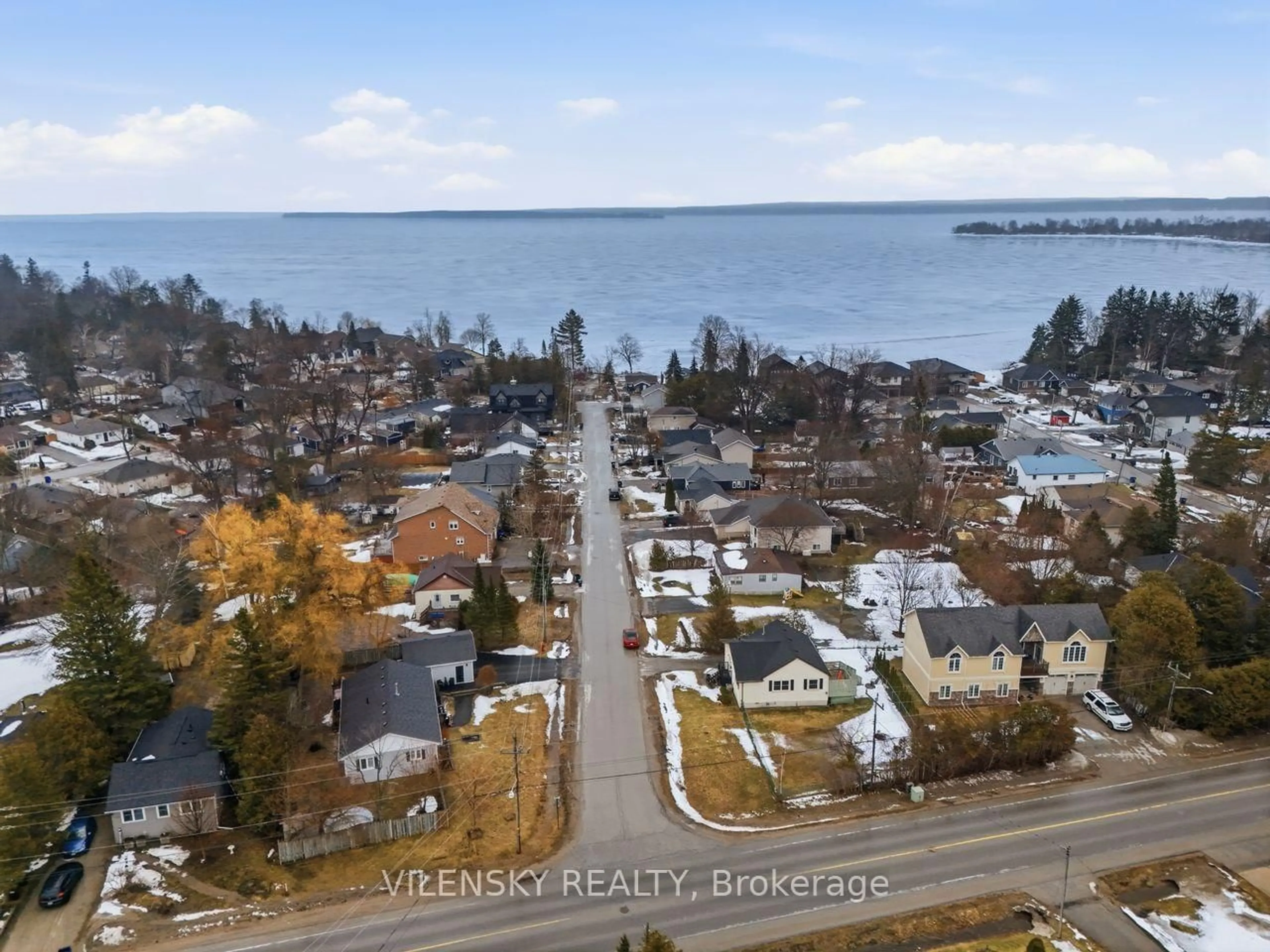 A pic from outside/outdoor area/front of a property/back of a property/a pic from drone, water/lake/river/ocean view for 941 Vicrol Dr, Innisfil Ontario L9S 1V4