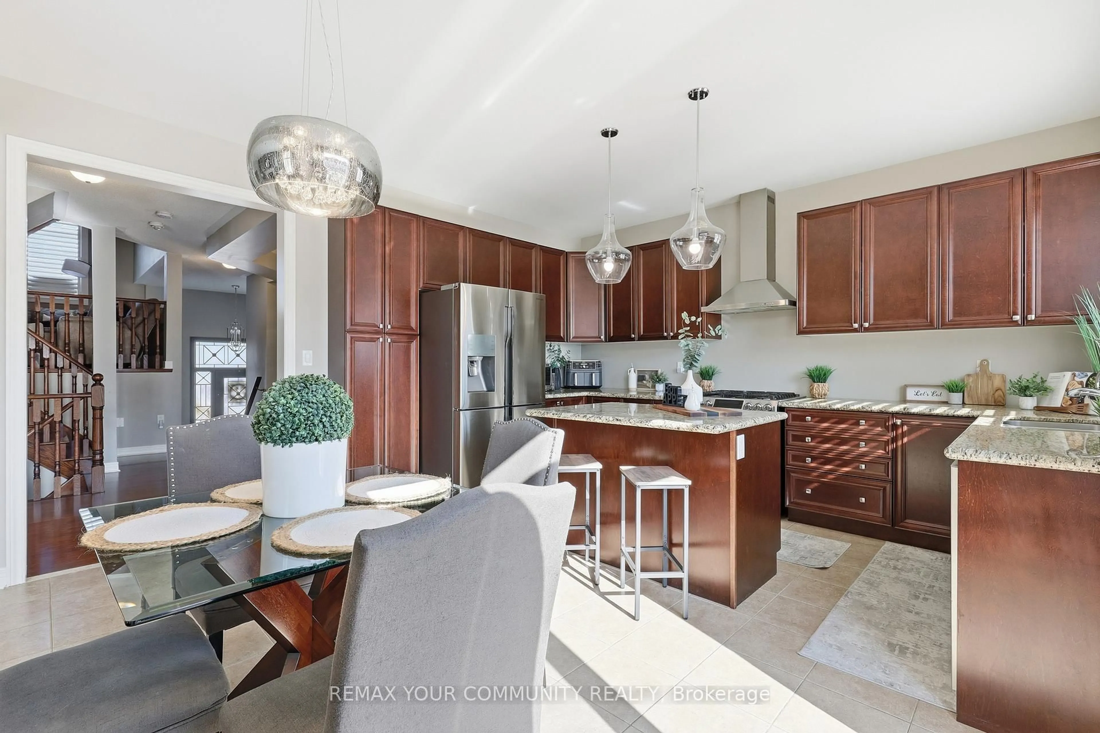 Open concept kitchen, ceramic/tile floor for 21 McCabe Lane, New Tecumseth Ontario L0G 1W0