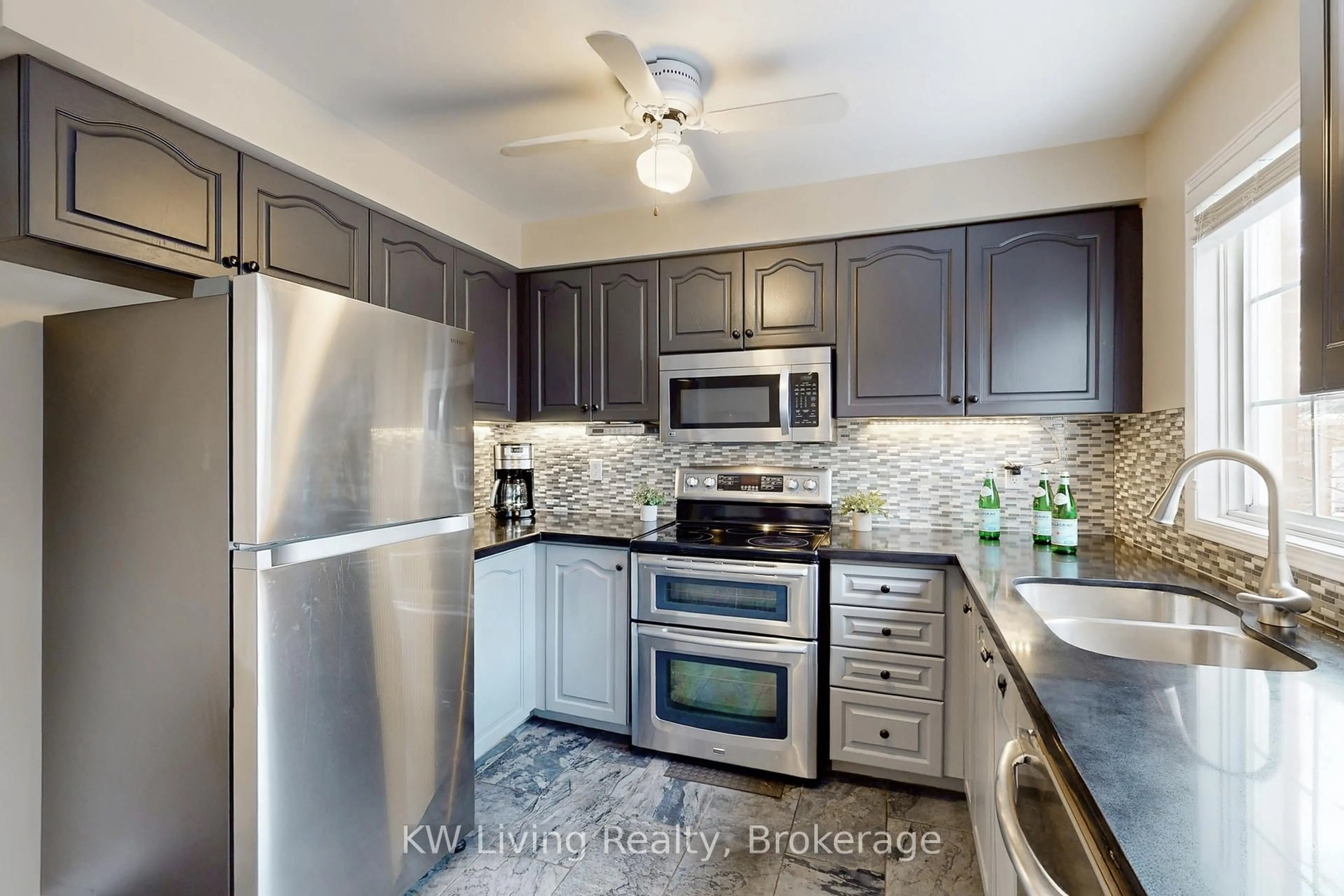 Standard kitchen, ceramic/tile floor for 81 Mosaics Ave #62, Aurora Ontario L4G 7L5