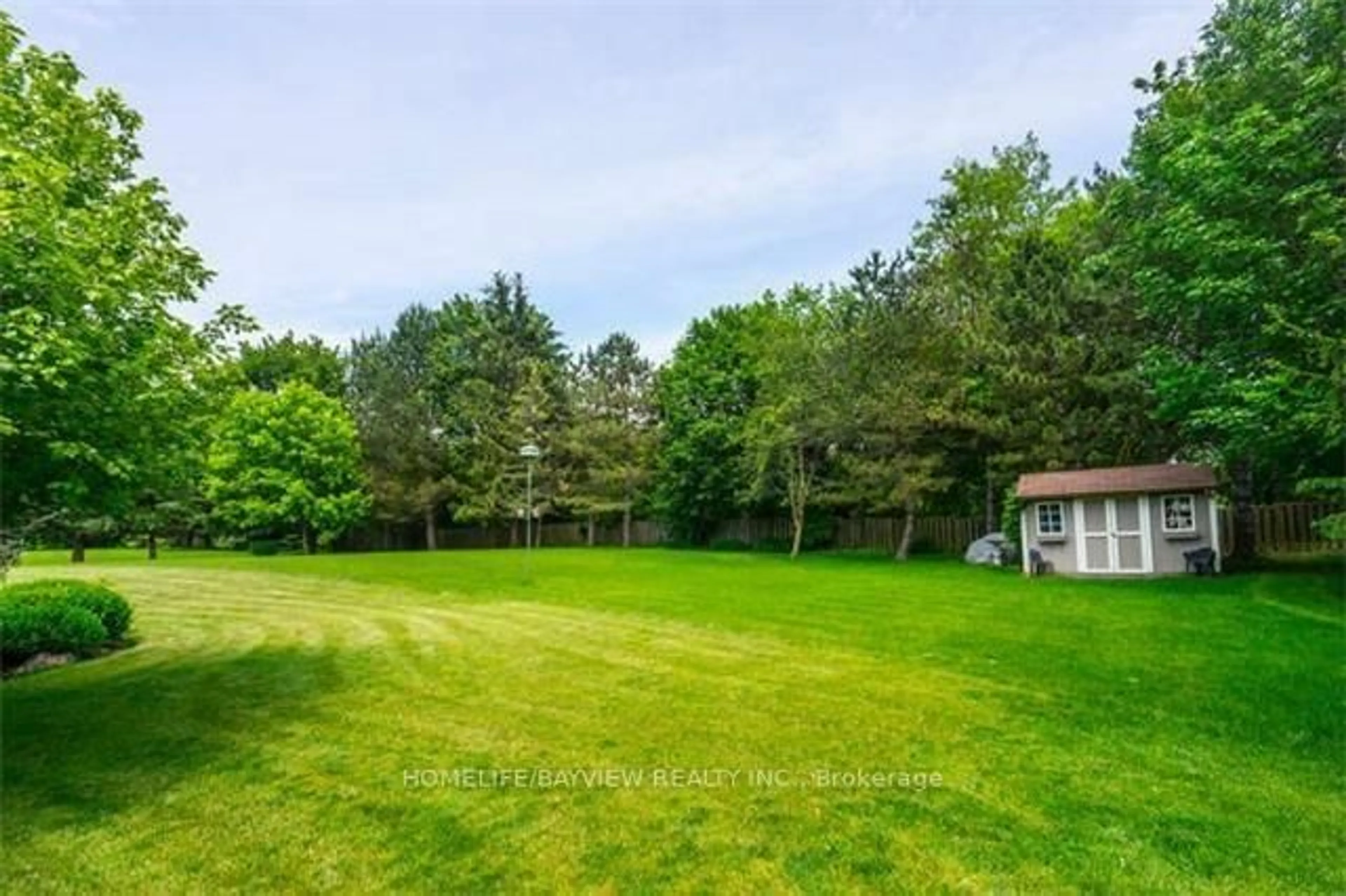 A pic from outside/outdoor area/front of a property/back of a property/a pic from drone, forest/trees view for 70 Russell Snider Dr, King Ontario L0G 1N0