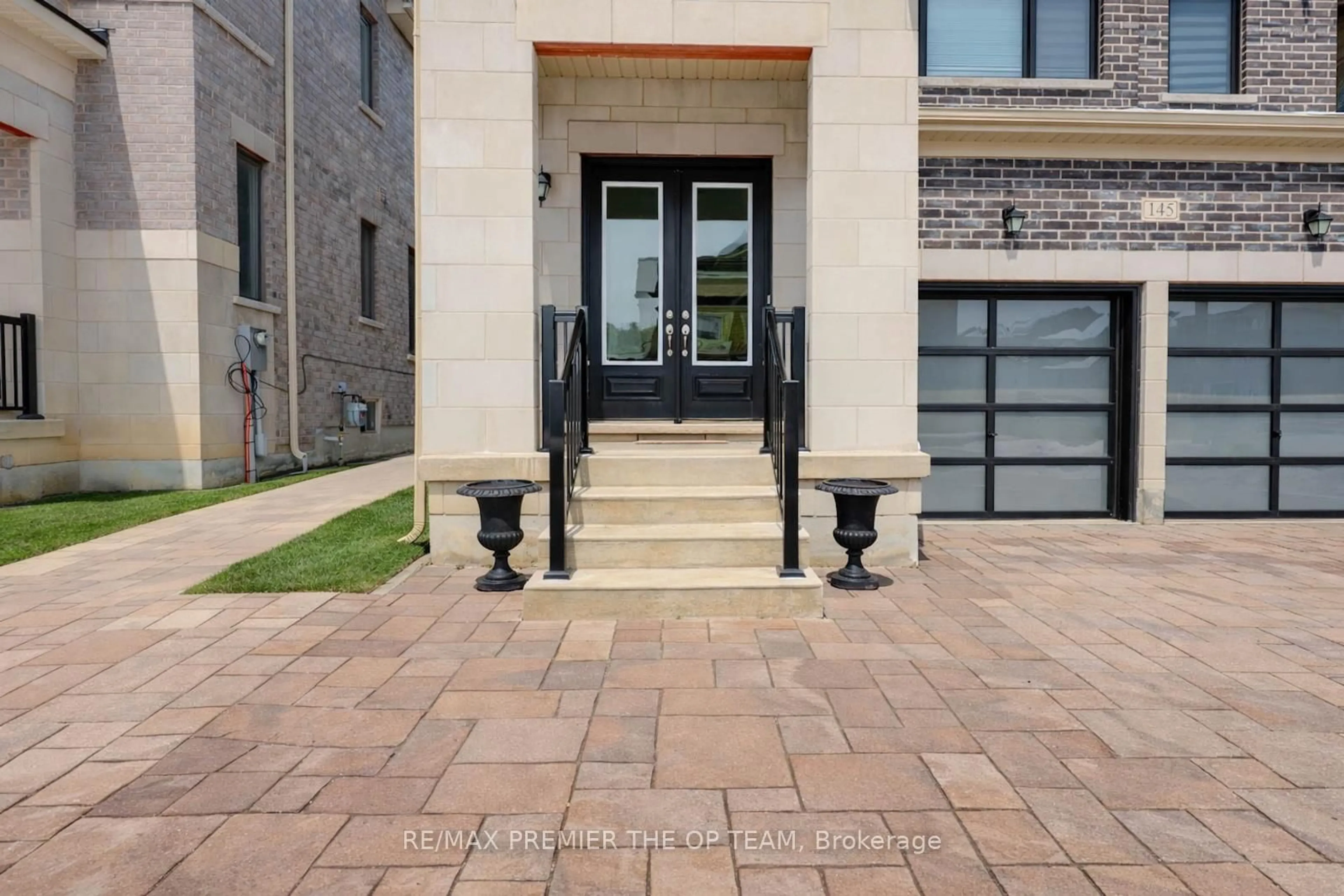 Home with brick exterior material, street for 145 Timber Creek Blvd, Vaughan Ontario L4H 3X8