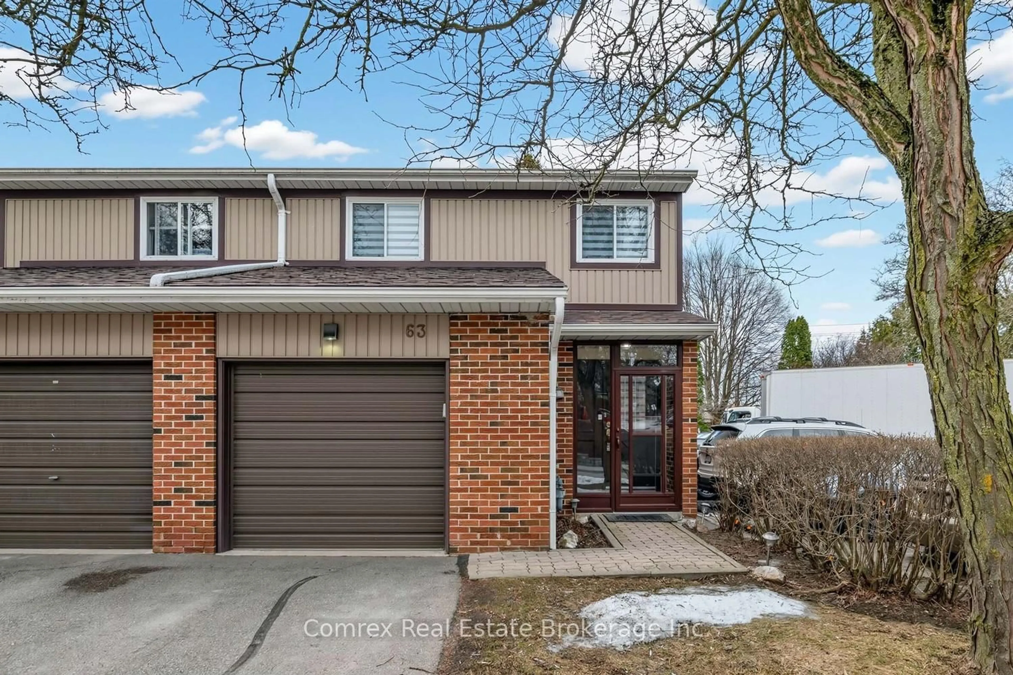 Home with brick exterior material, street for 63 Kindale Way, Markham Ontario L3T 4Z2