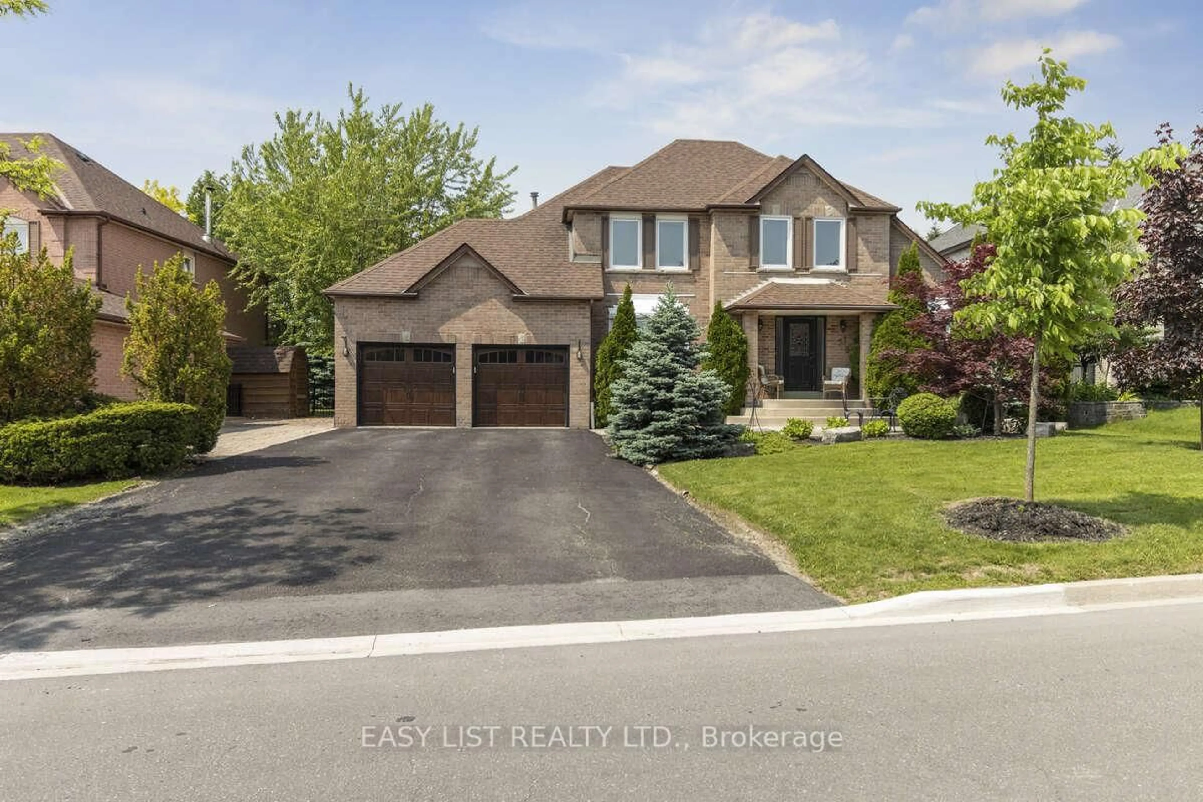 Home with brick exterior material, street for 31 Bloomfield Tr, Richmond Hill Ontario L4E 2J8