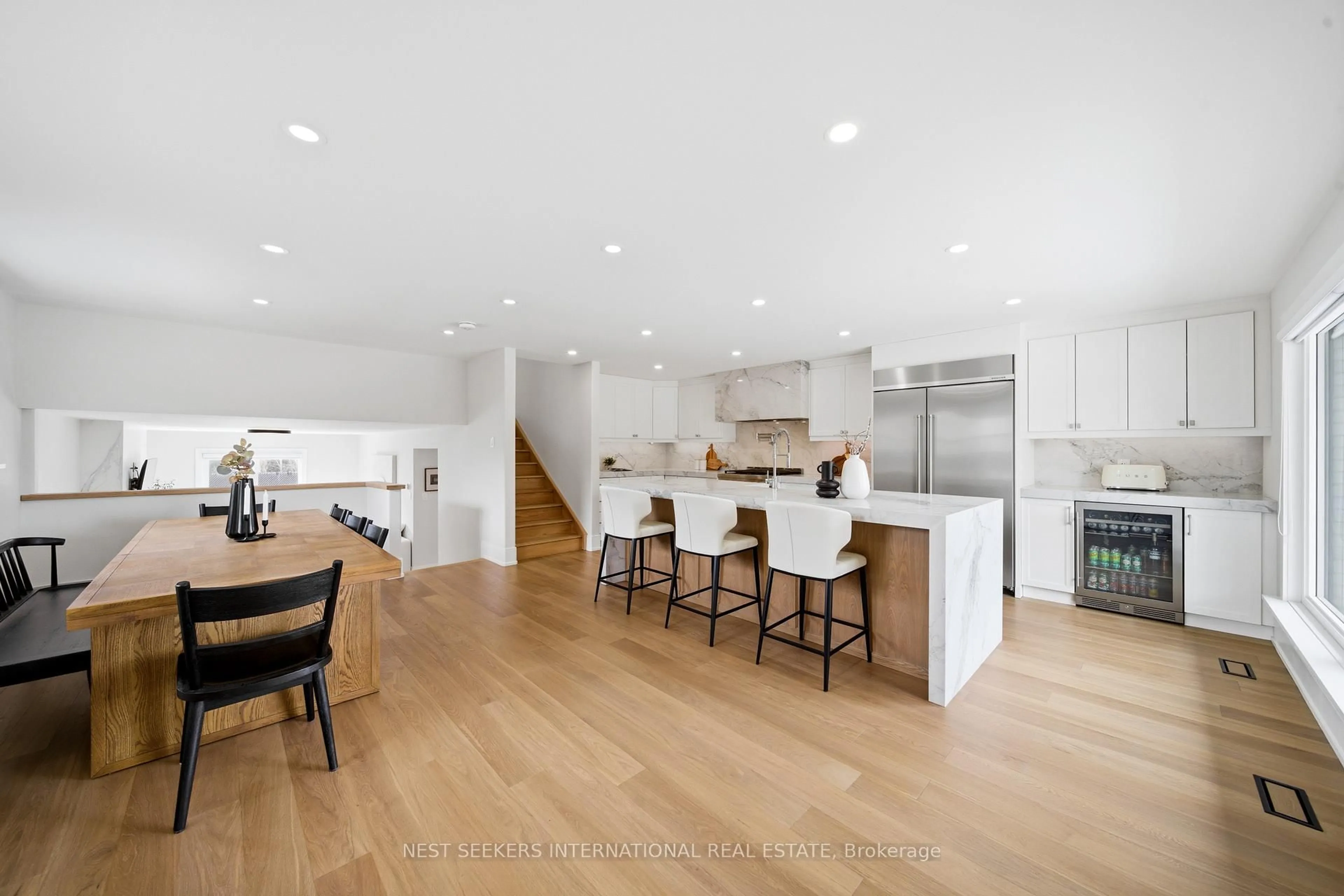 Open concept kitchen, wood/laminate floor for 5105 Lloydtown Aurora Rd, King Ontario L7B 0E2