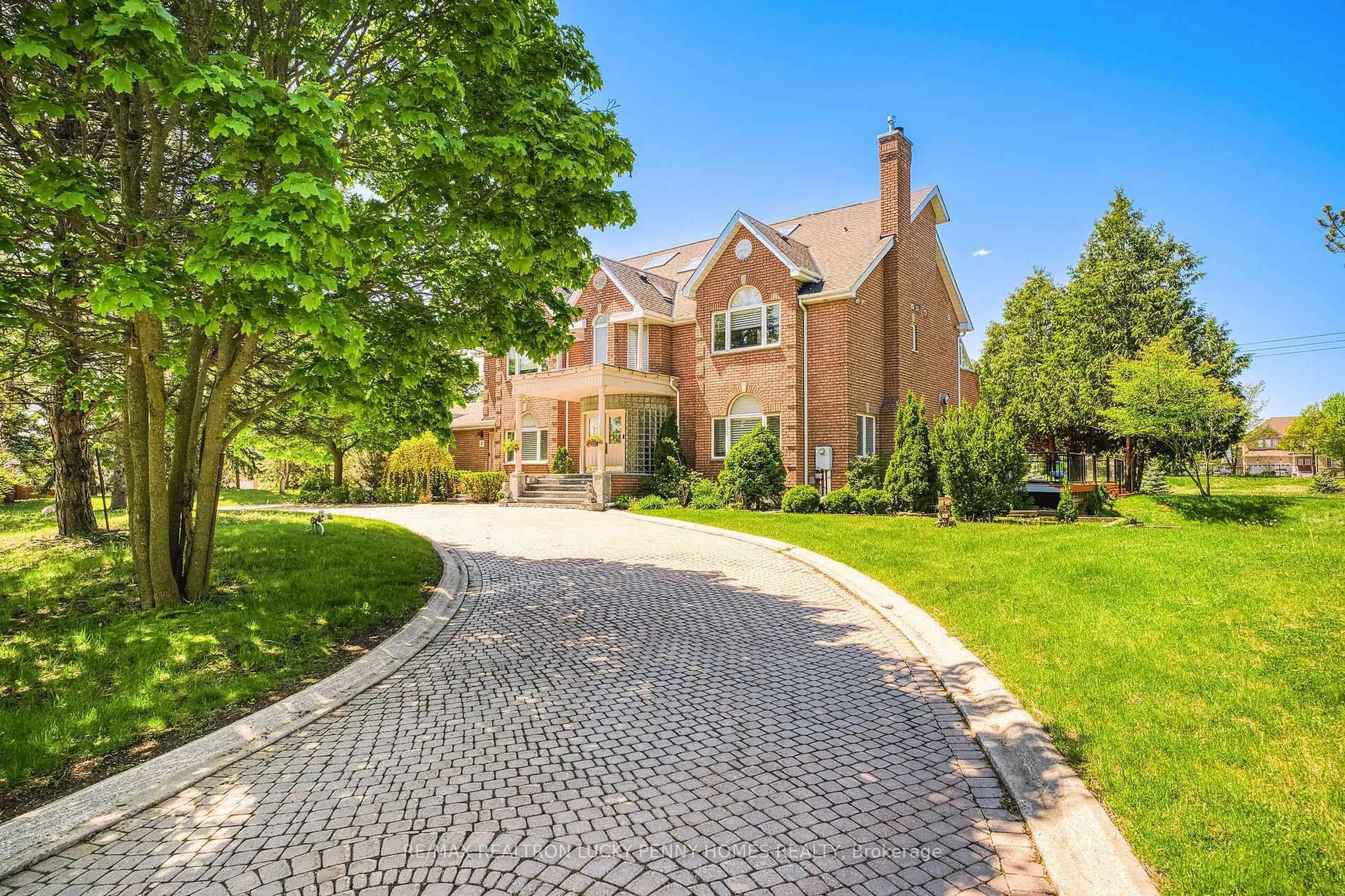 Home with brick exterior material, street for 2 Jennings Gate, Markham Ontario L6C 1A9