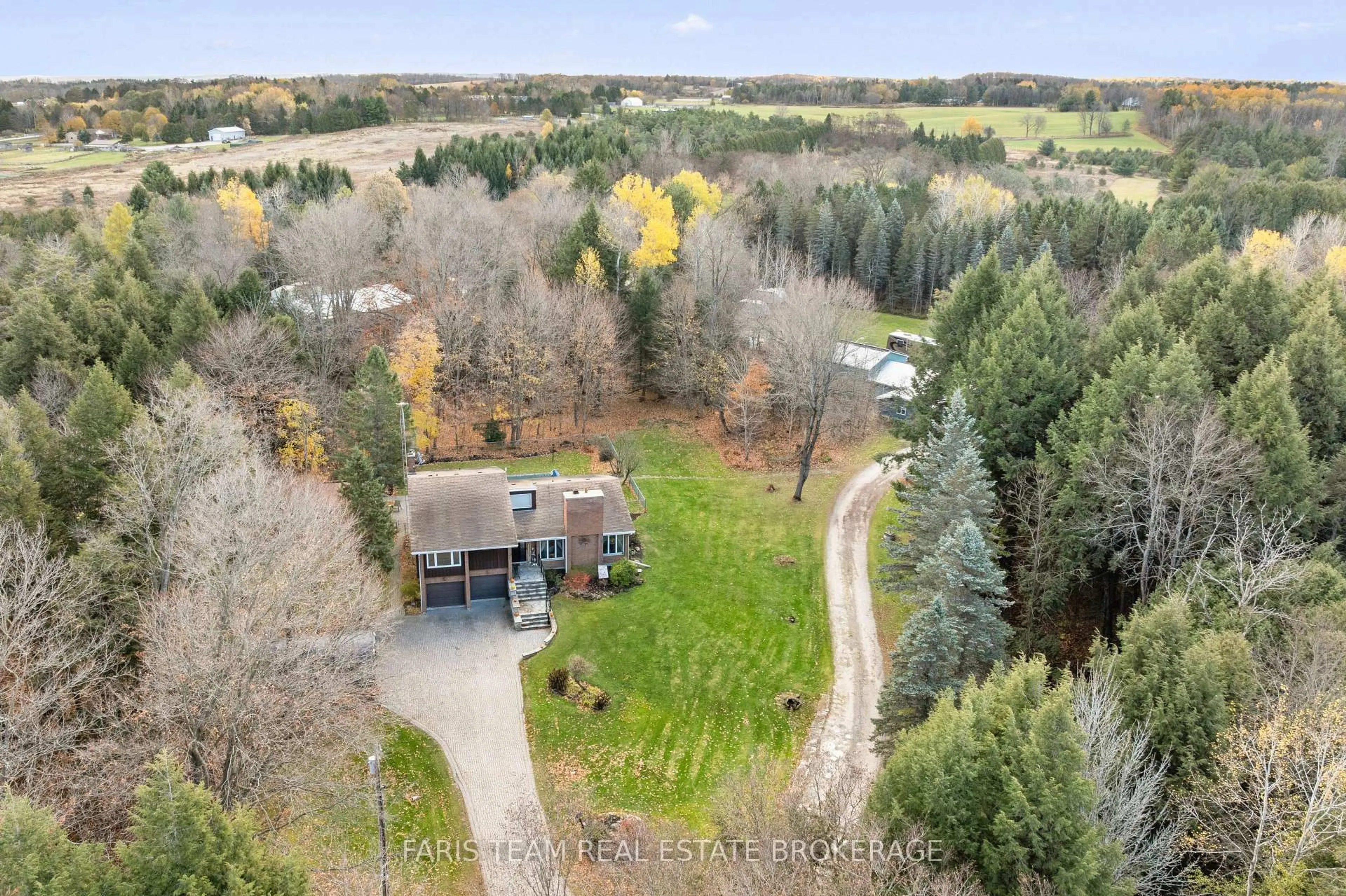A pic from outside/outdoor area/front of a property/back of a property/a pic from drone, forest/trees view for 5565 5th Line, New Tecumseth Ontario L0G 1W0