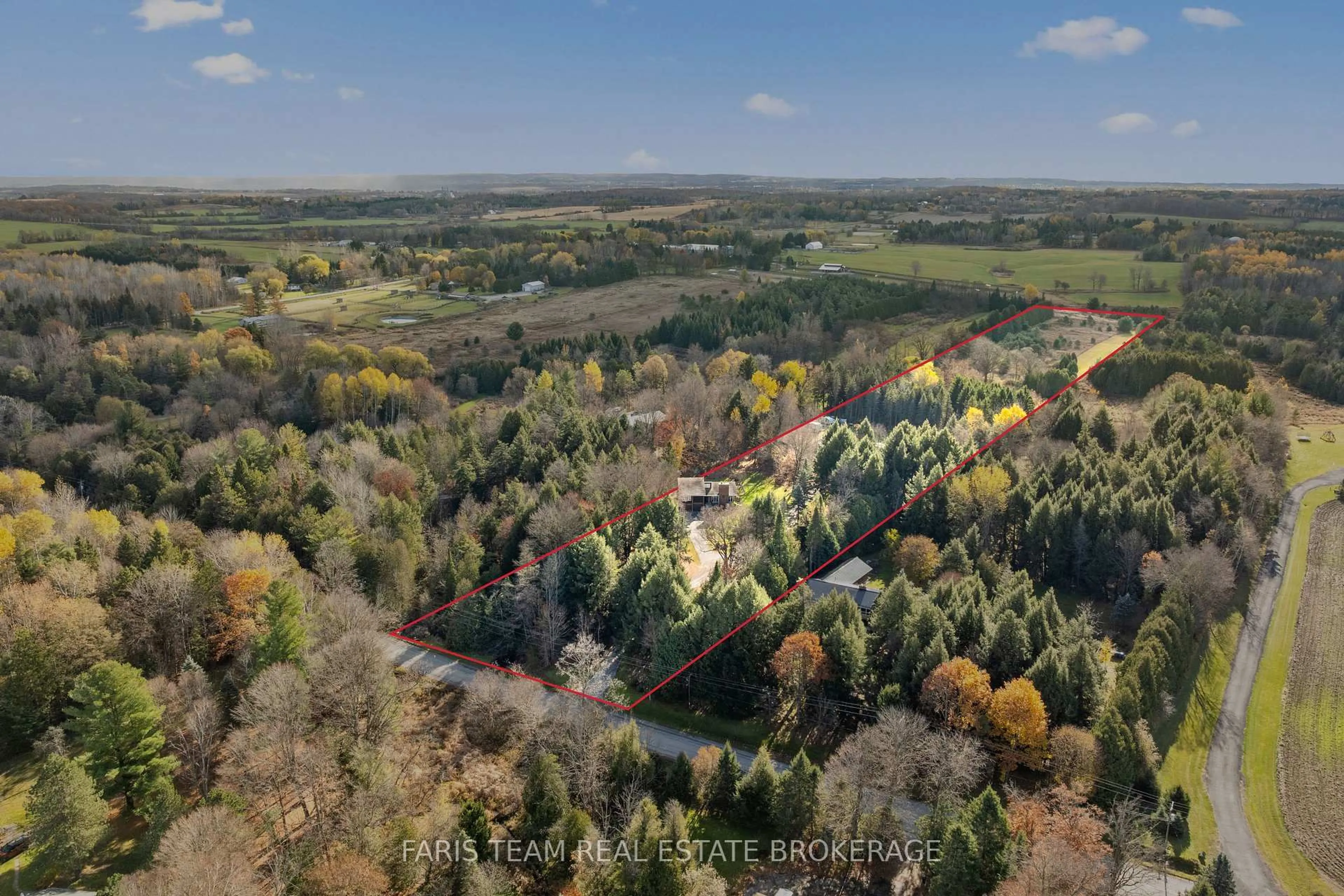 A pic from outside/outdoor area/front of a property/back of a property/a pic from drone, forest/trees view for 5565 5th Line, New Tecumseth Ontario L0G 1W0