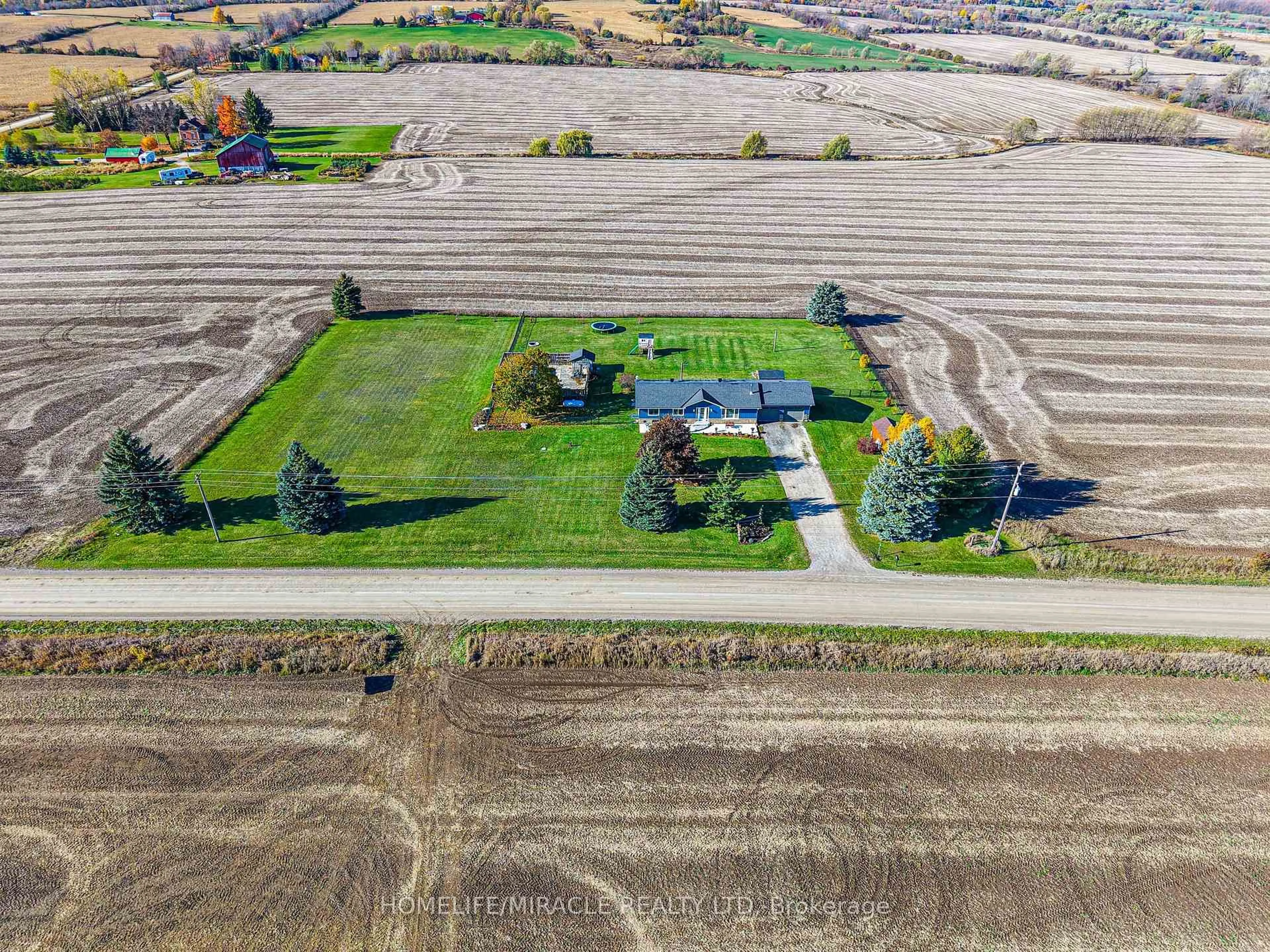 A pic from outside/outdoor area/front of a property/back of a property/a pic from drone, street for 4700 Concession Rd 3, Adjala-Tosorontio Ontario L9R 1V1