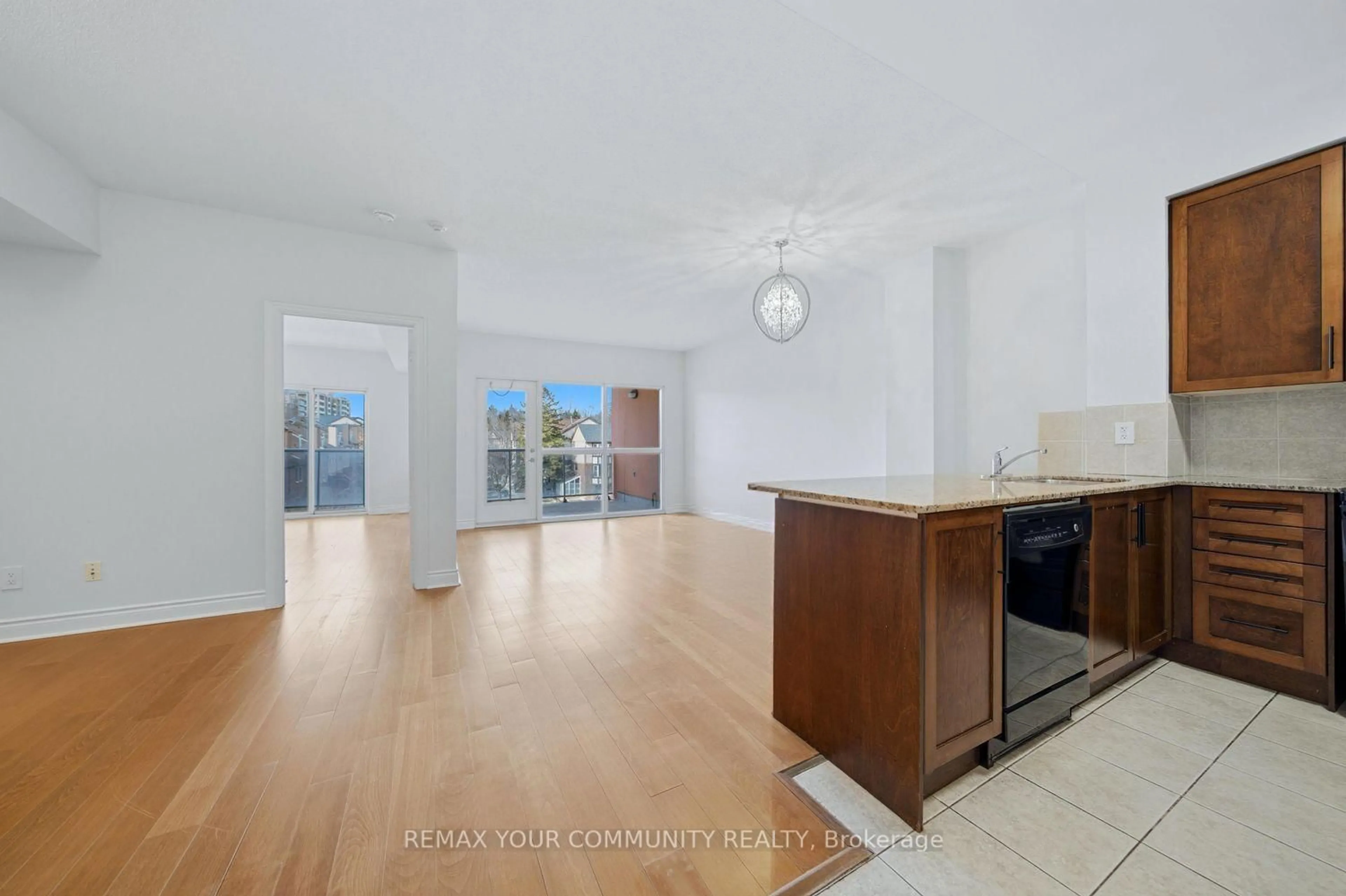 Open concept kitchen, floor is not visible for 160 Woodbridge Ave #409, Vaughan Ontario L4L 0B8