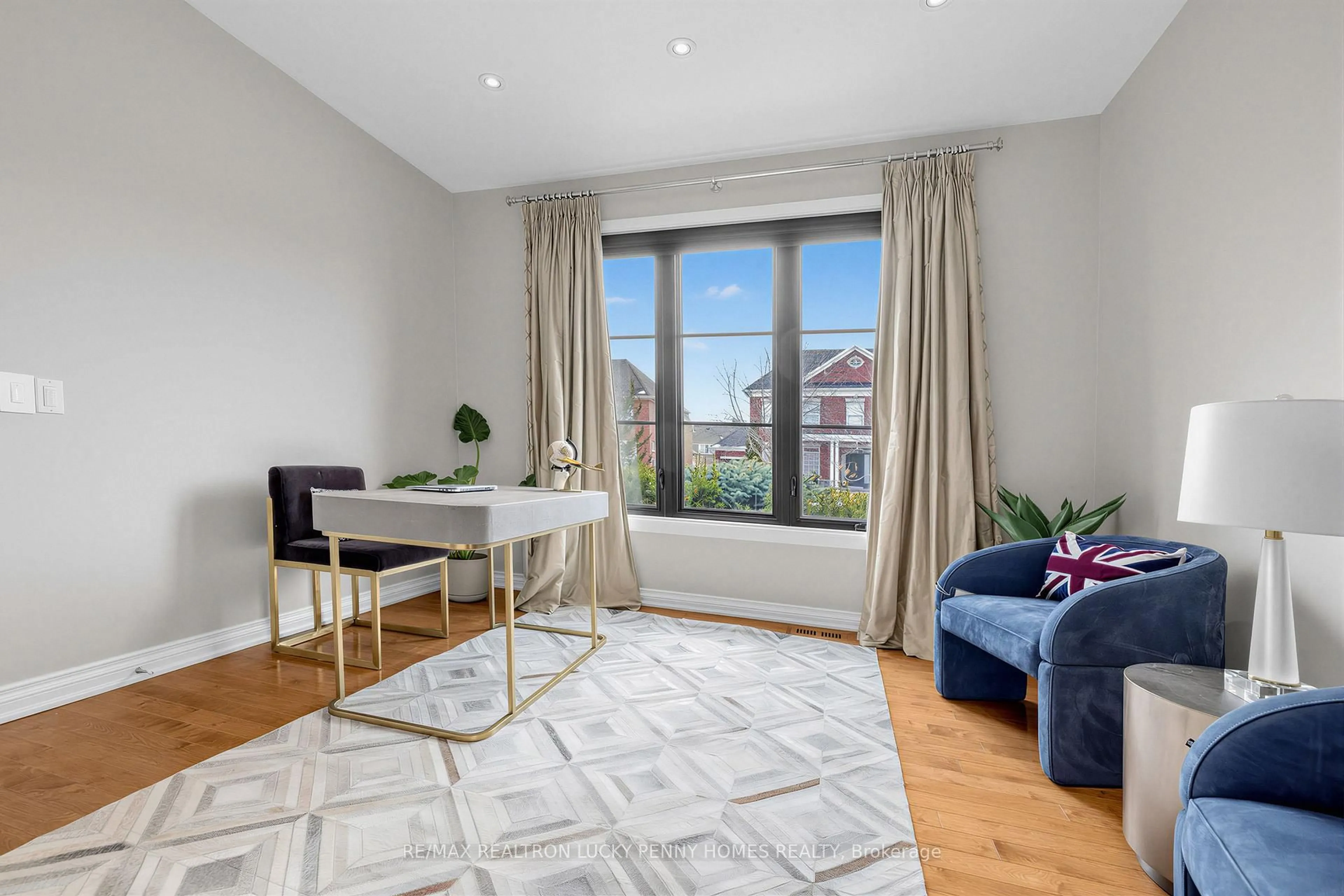 Living room with furniture, wood/laminate floor for 80 Angus Glen Blvd, Markham Ontario L6C 1Z4