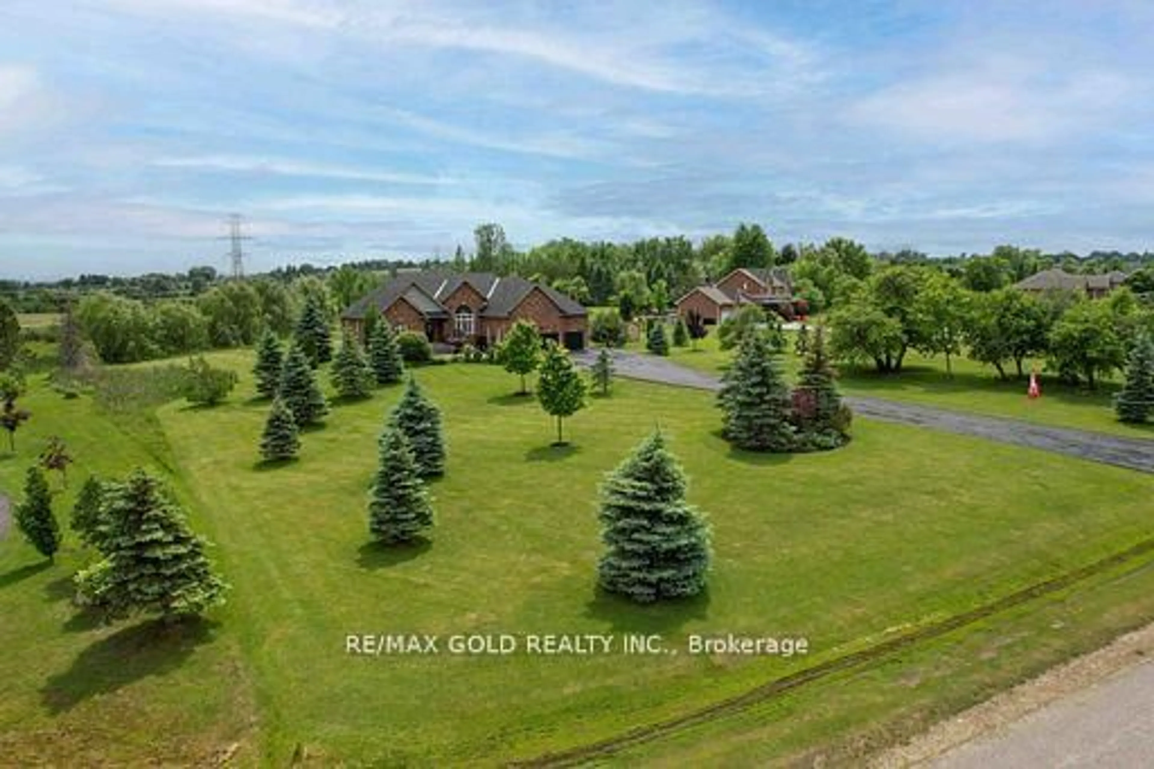 A pic from outside/outdoor area/front of a property/back of a property/a pic from drone, forest/trees view for 9 Apple Valley Lane, Adjala-Tosorontio Ontario L0M 1J0