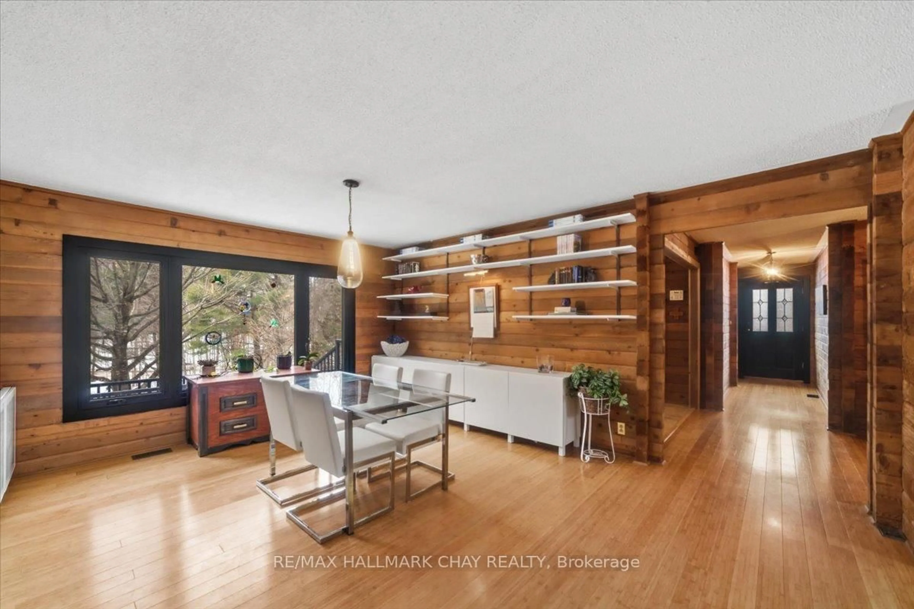 Living room with furniture, wood/laminate floor for 8361 11th Line, Essa Ontario L0L 2N0