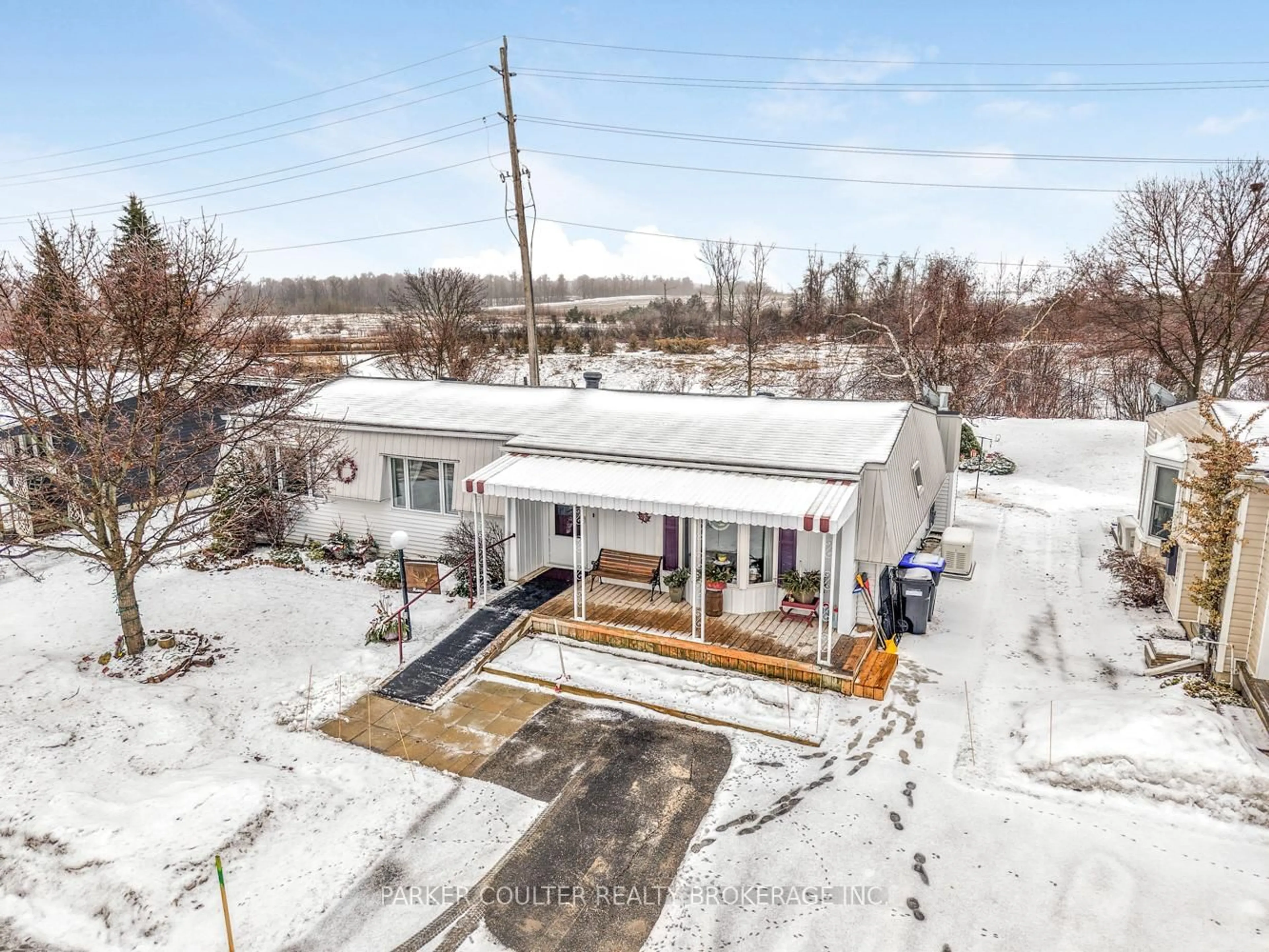 A pic from outside/outdoor area/front of a property/back of a property/a pic from drone, unknown for 5 Hearts Content, Innisfil Ontario L9S 1S2