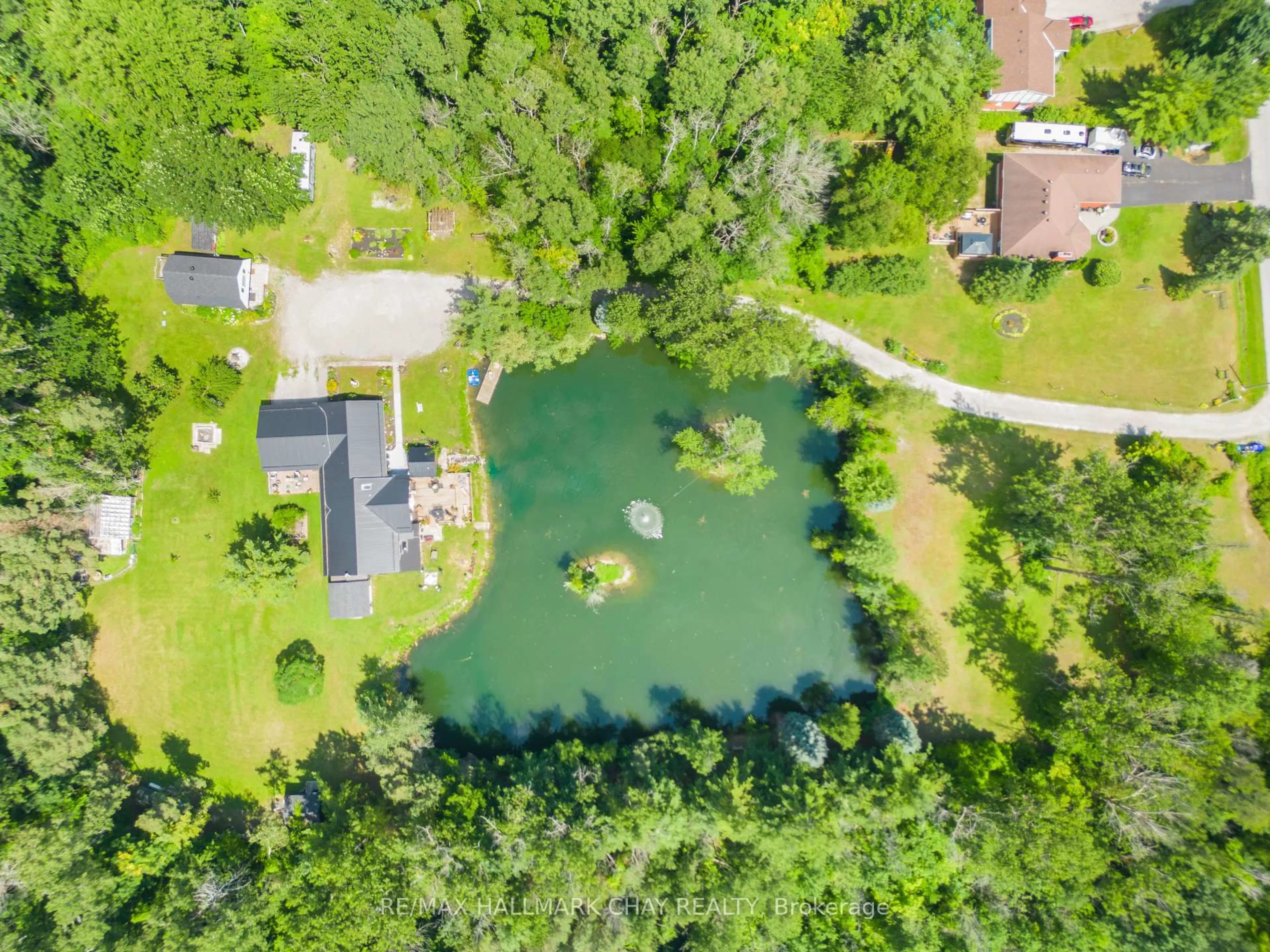 A pic from outside/outdoor area/front of a property/back of a property/a pic from drone, water/lake/river/ocean view for 1114 Goshen Rd, Innisfil Ontario L9S 2M5