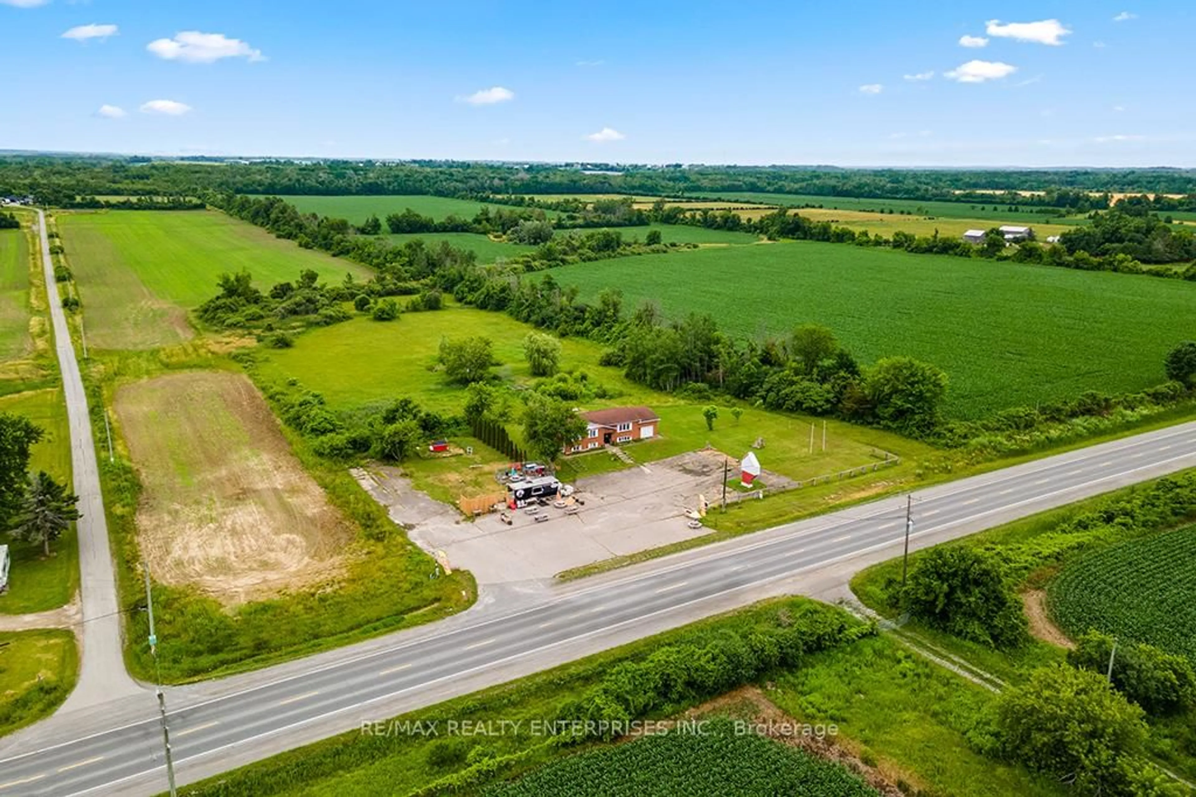 A pic from outside/outdoor area/front of a property/back of a property/a pic from drone, unknown for 27887 Highway 48, Georgina Ontario L0E 1R0