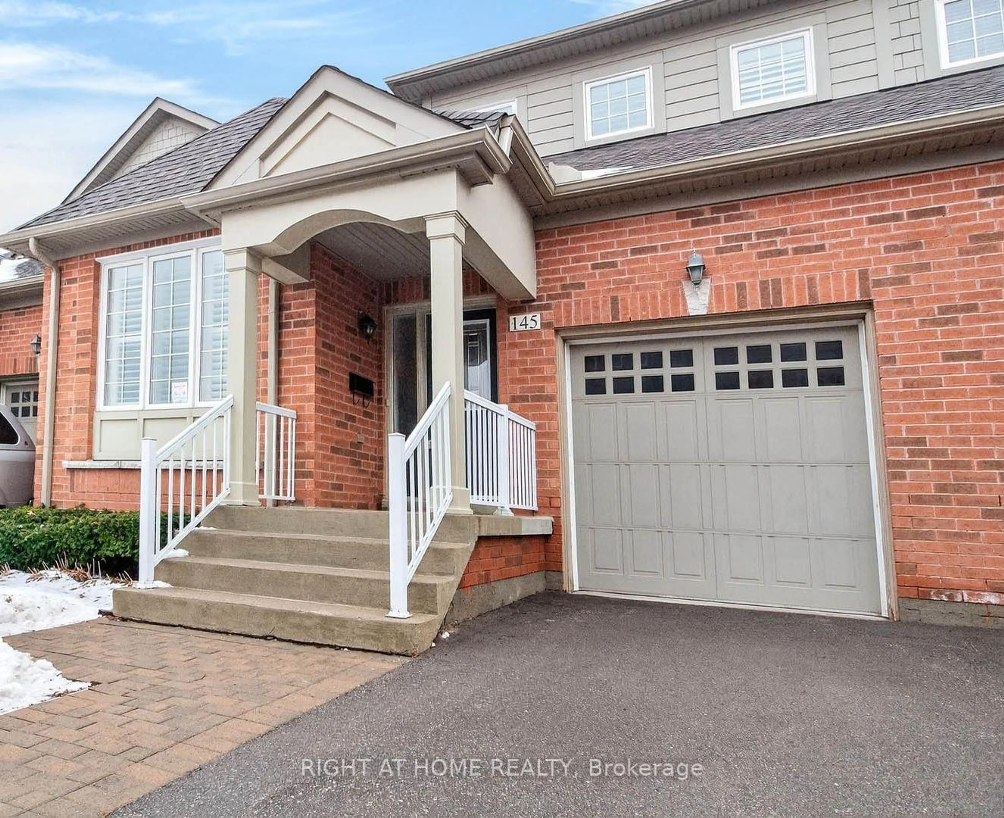 Home with brick exterior material, street for 145 Louisbourg Way, Markham Ontario L6E 2A2