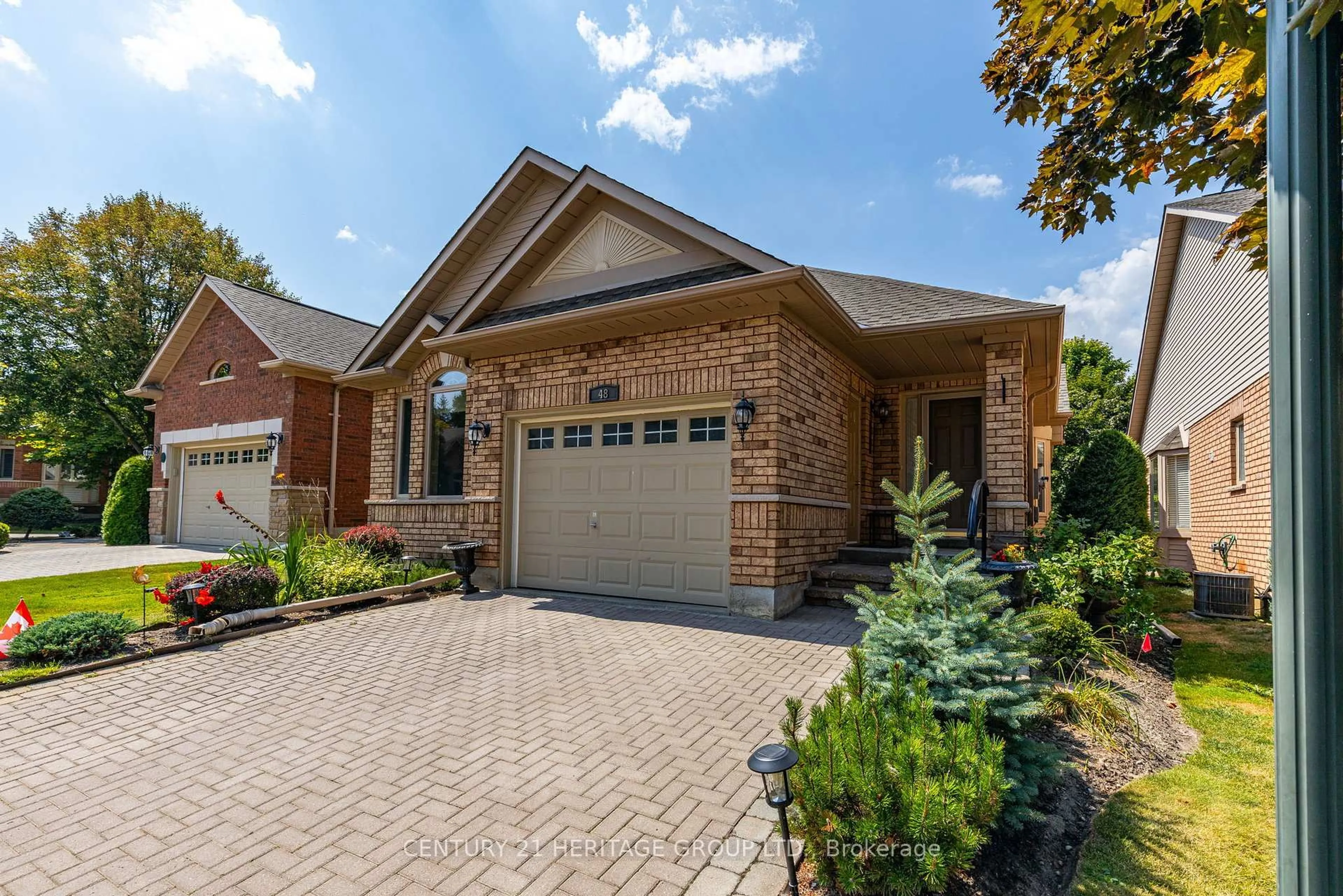 Home with brick exterior material, street for 48 Sunset Blvd #3, New Tecumseth Ontario L9R 1Z5