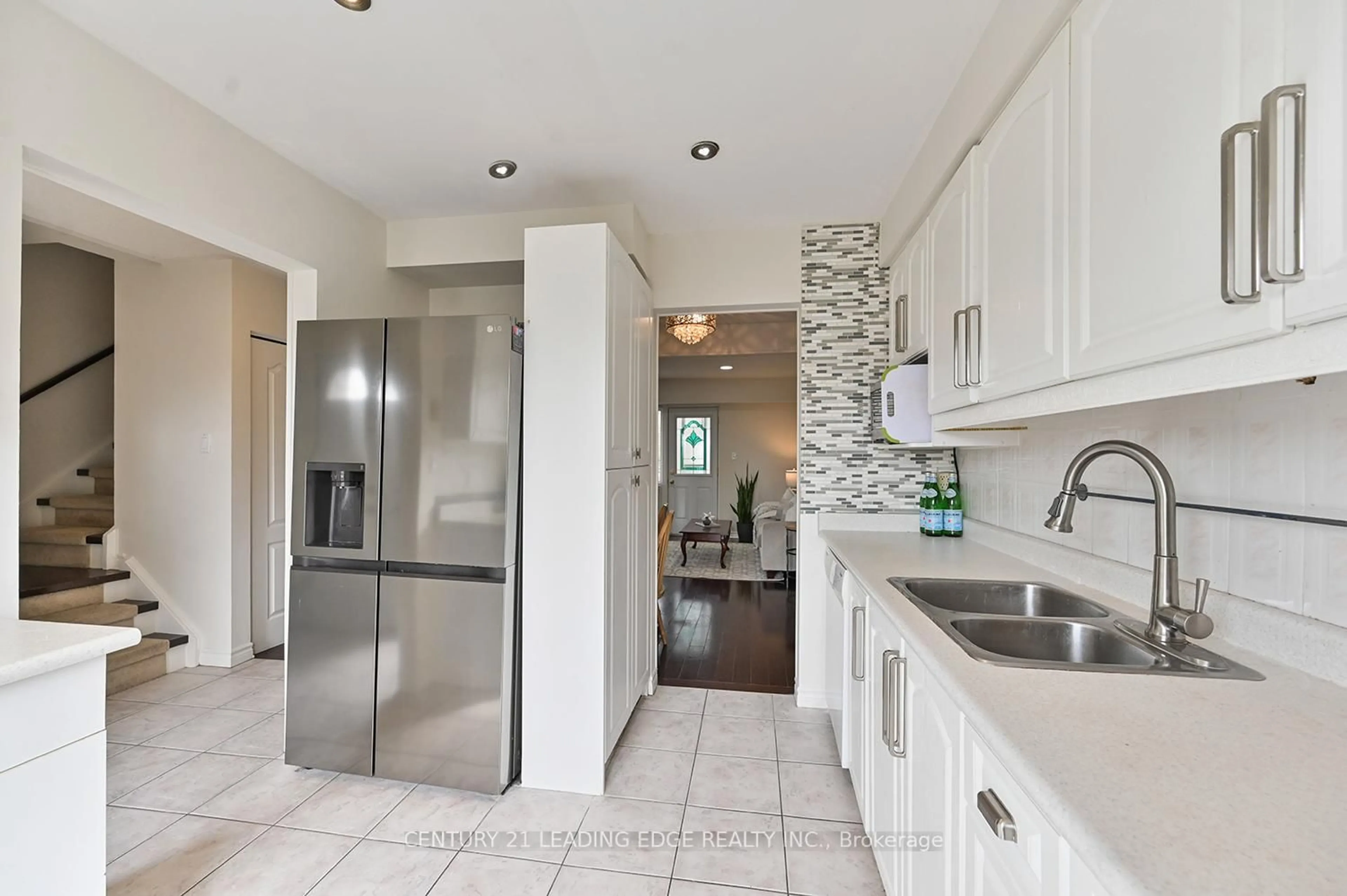 Contemporary kitchen, ceramic/tile floor for 1 Wootten Way #15, Markham Ontario L3P 3H7