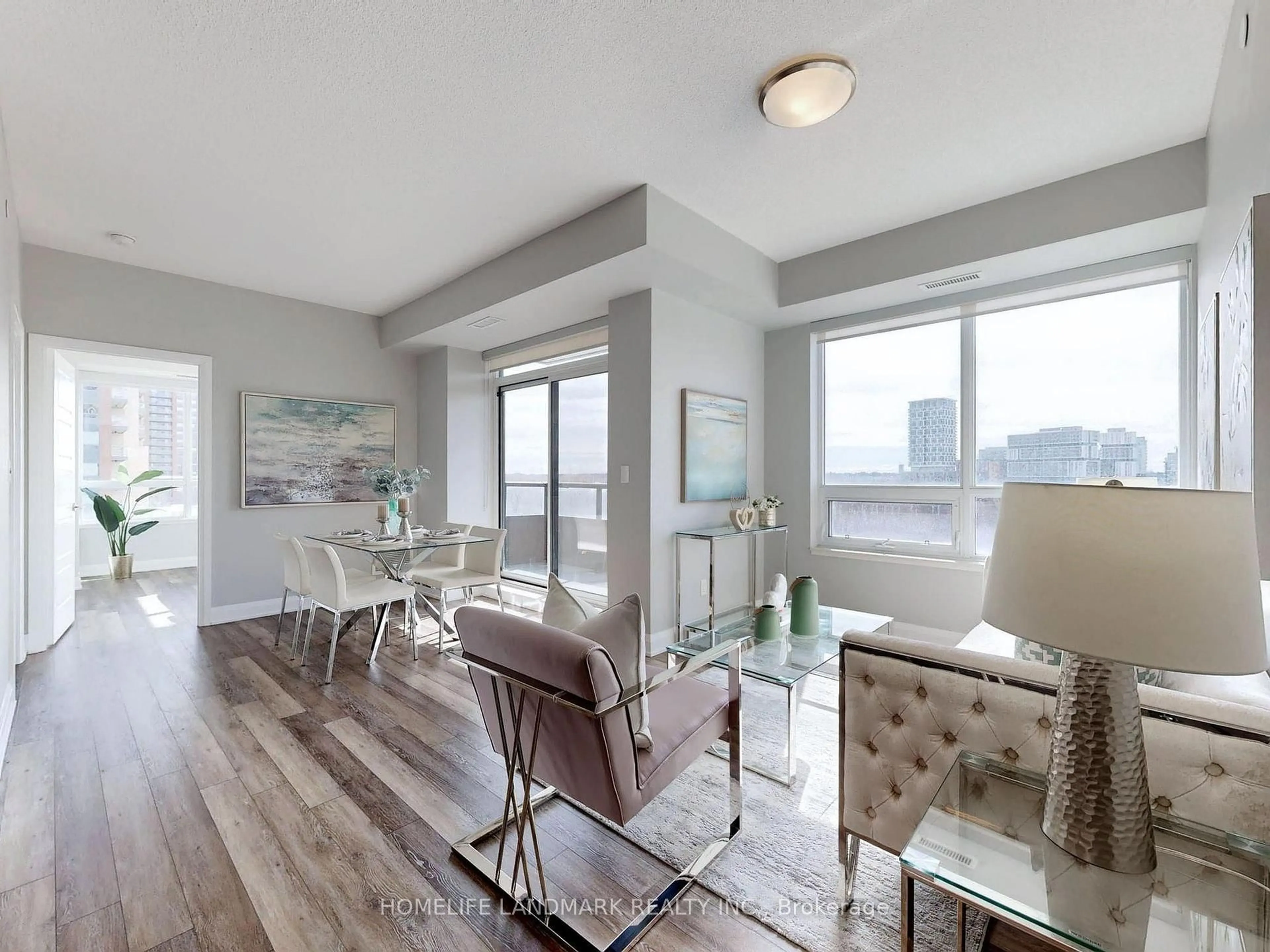 Living room with furniture, wood/laminate floor for 15 Water Walk Dr #712, Markham Ontario L6G 0G2