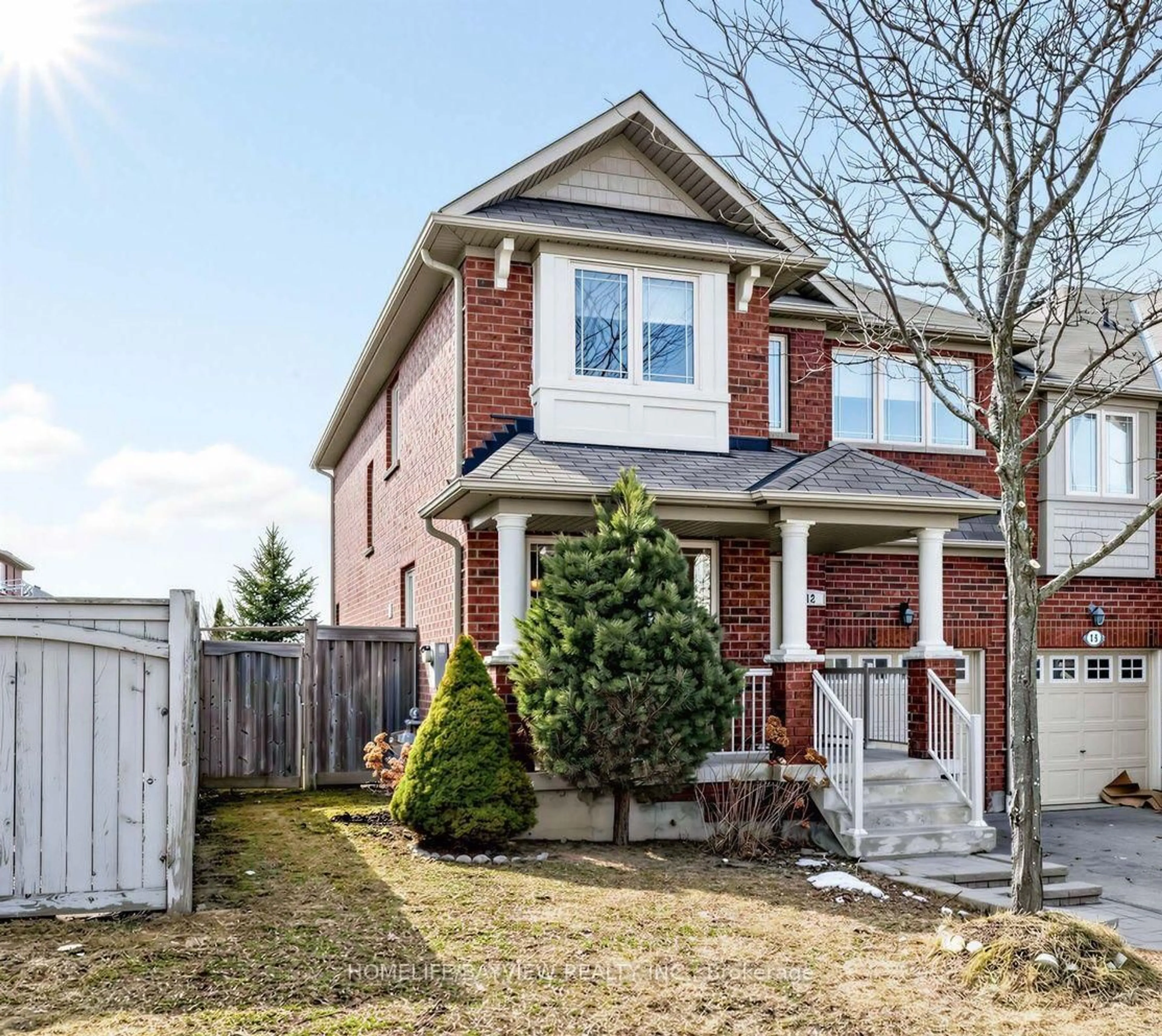 Home with brick exterior material, street for 12 Winisk St, Richmond Hill Ontario L4E 0M6