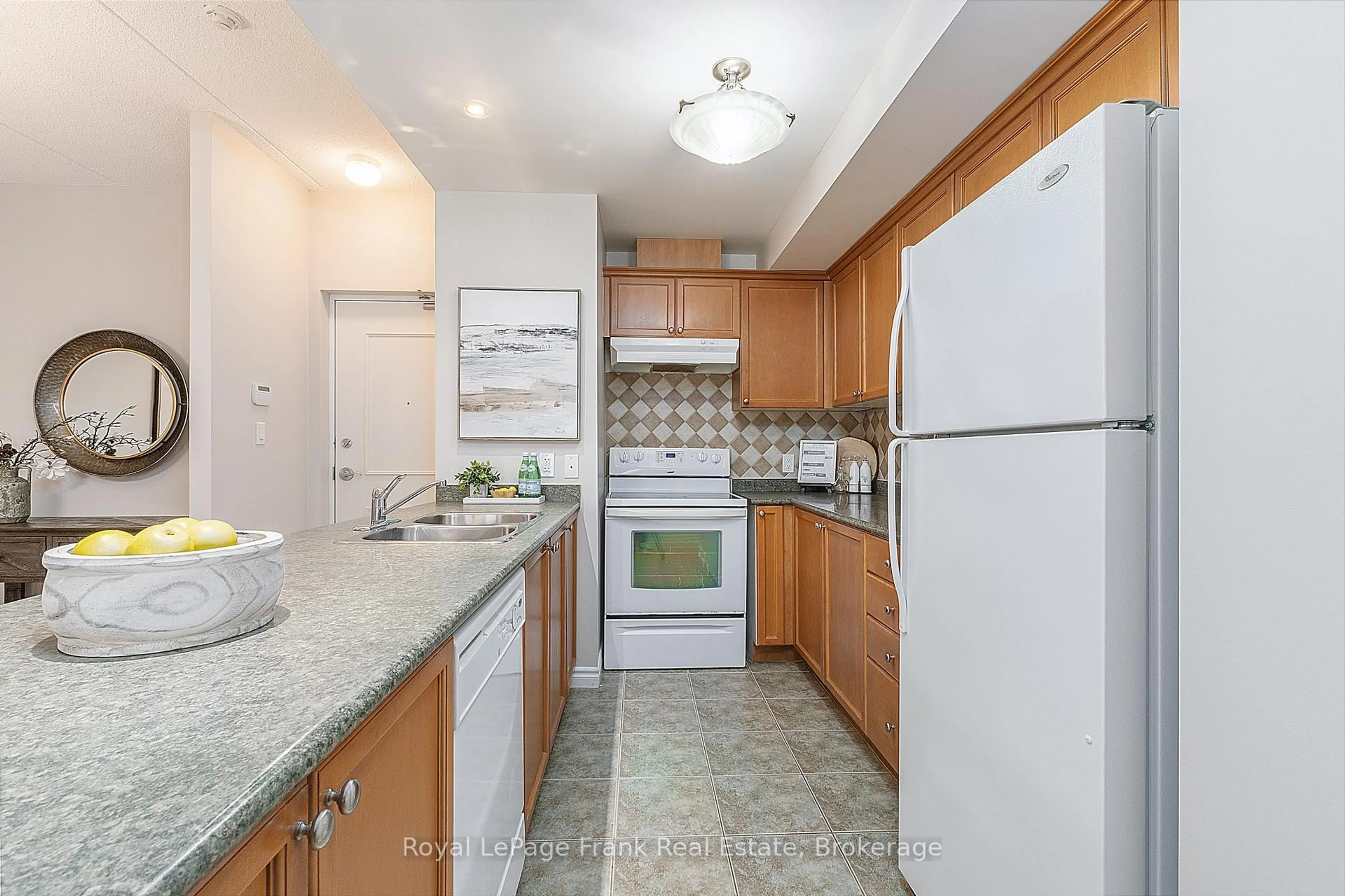 Standard kitchen, ceramic/tile floor for 220 Main St #207, Uxbridge Ontario L9P 0B6