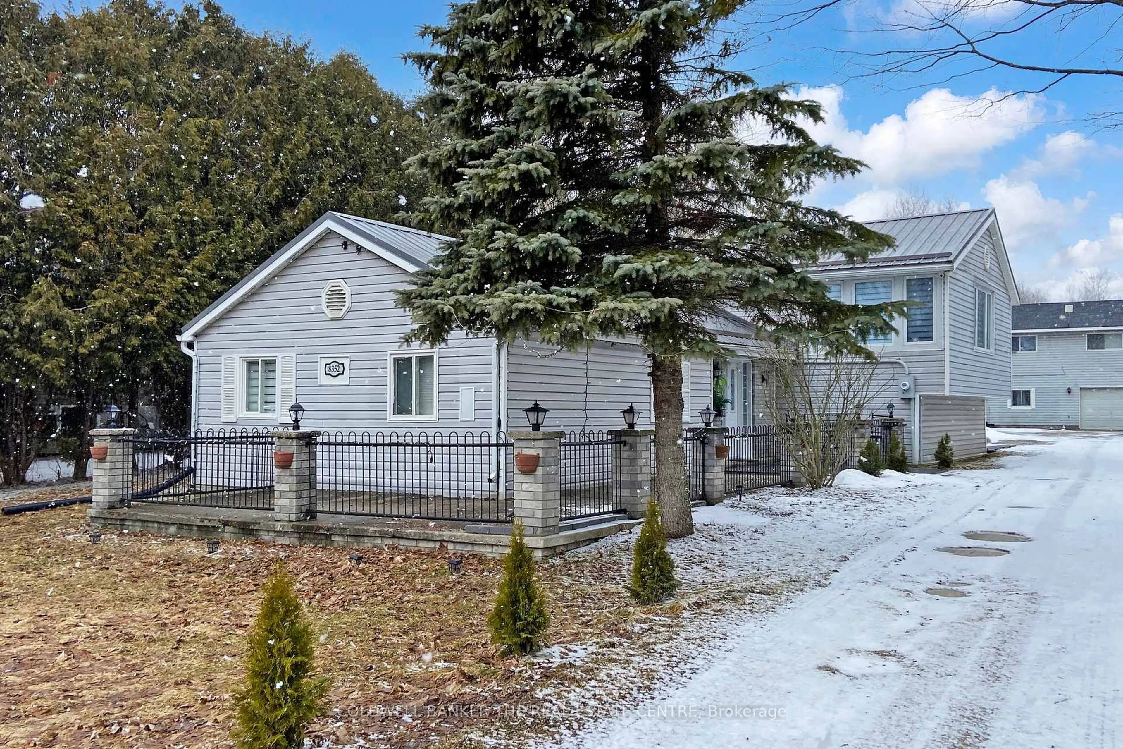 A pic from outside/outdoor area/front of a property/back of a property/a pic from drone, street for 8352 Main St, Adjala-Tosorontio Ontario L0M 1M0