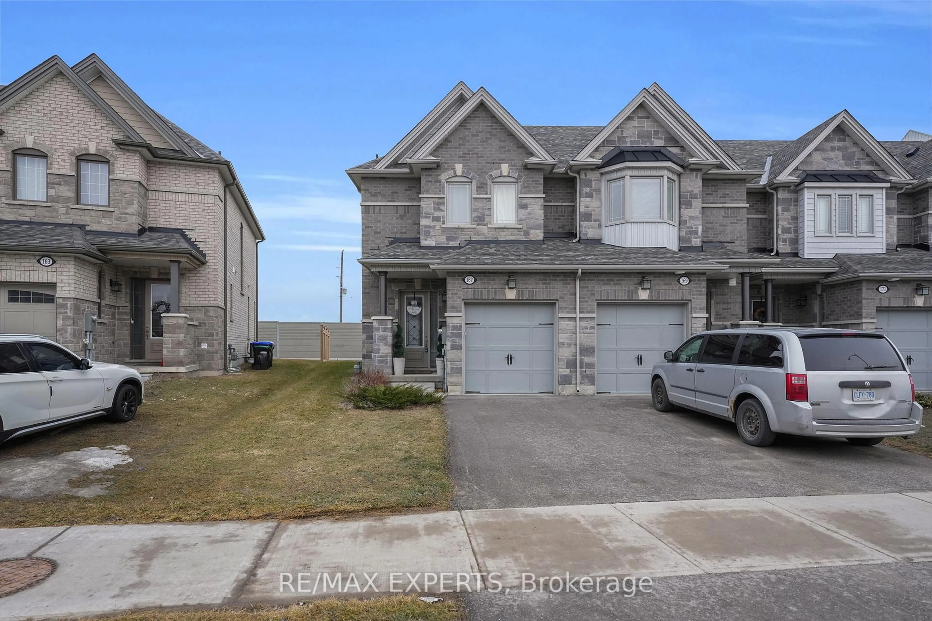 A pic from outside/outdoor area/front of a property/back of a property/a pic from drone, street for 167 Walker Blvd, New Tecumseth Ontario L9R 0R3