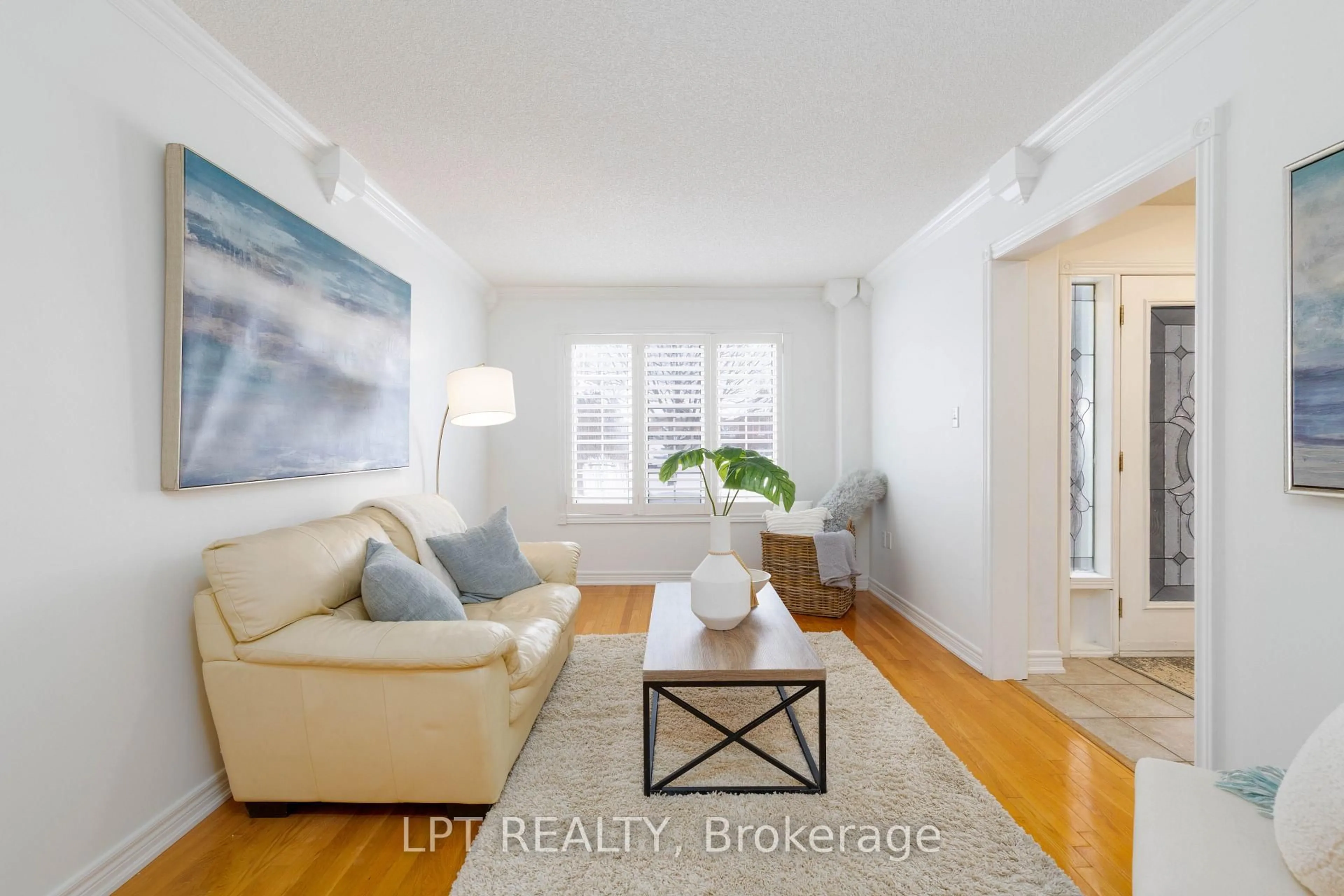 Living room with furniture, wood/laminate floor for 36 Ivygreen Rd, Georgina Ontario L4P 4B7