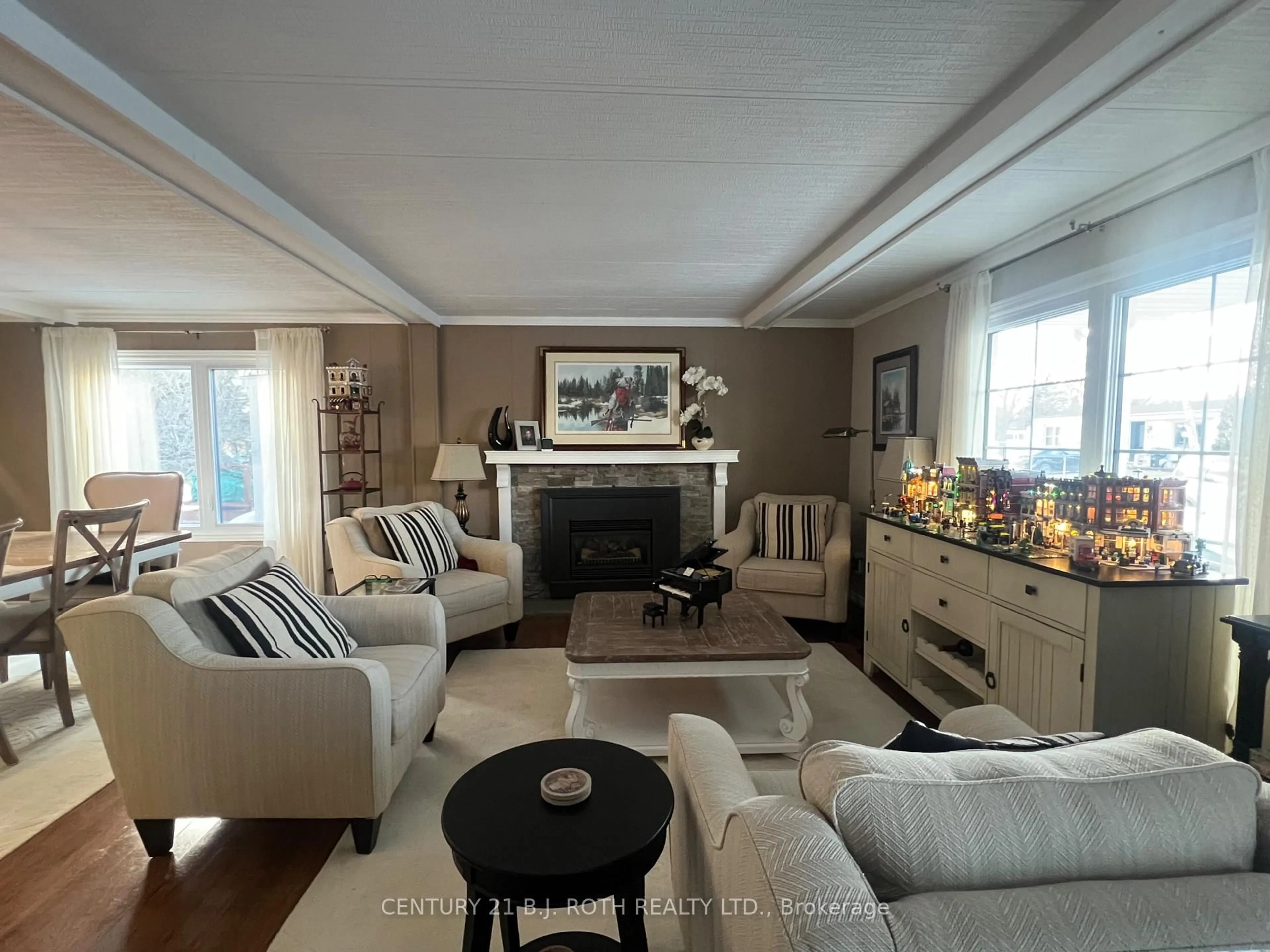 Living room with furniture, unknown for 29 Corner Brook Tr, Innisfil Ontario L9S 1P2