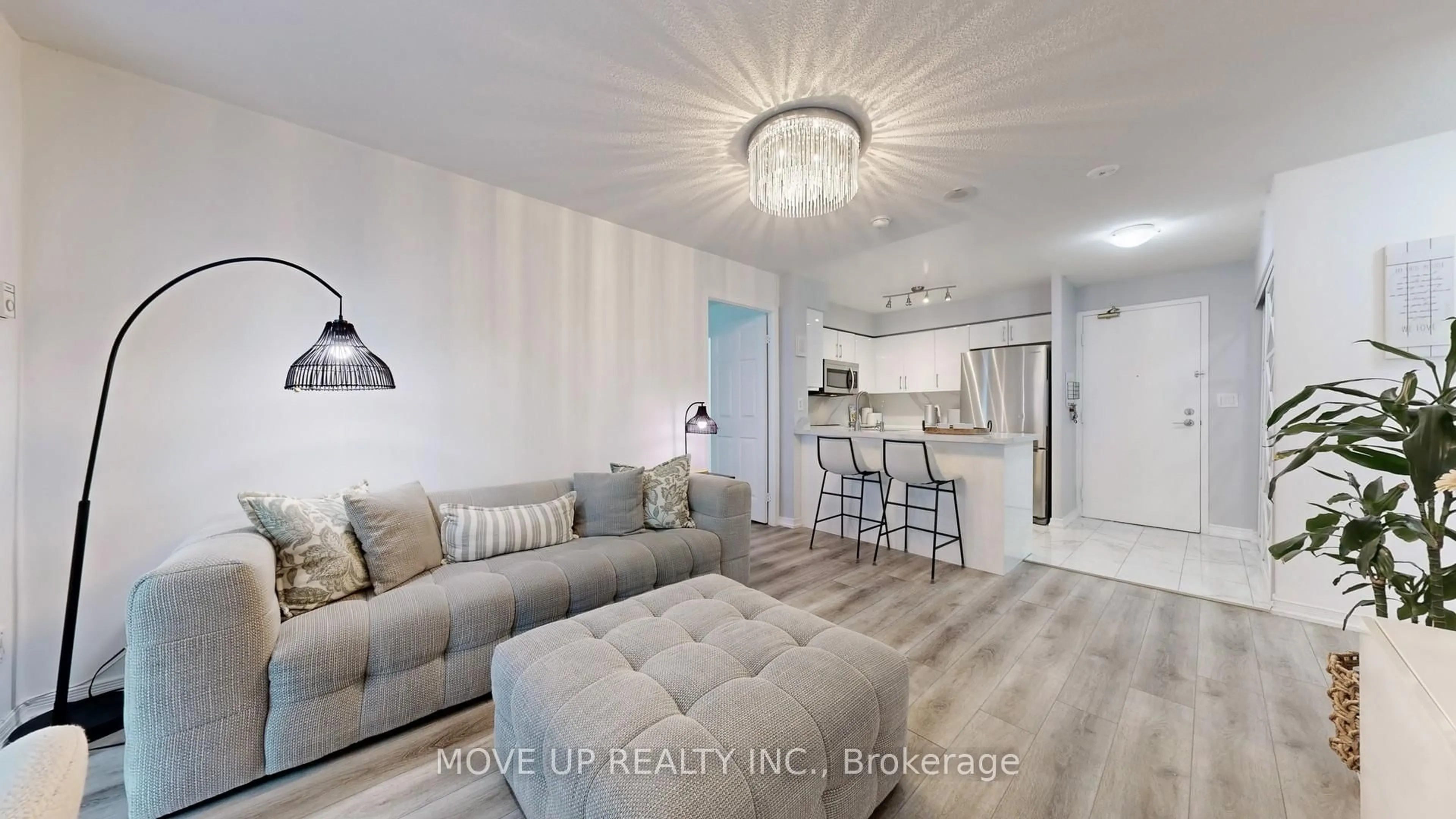 Living room with furniture, wood/laminate floor for 3 Ellesmere St #225, Richmond Hill Ontario L4B 4N2