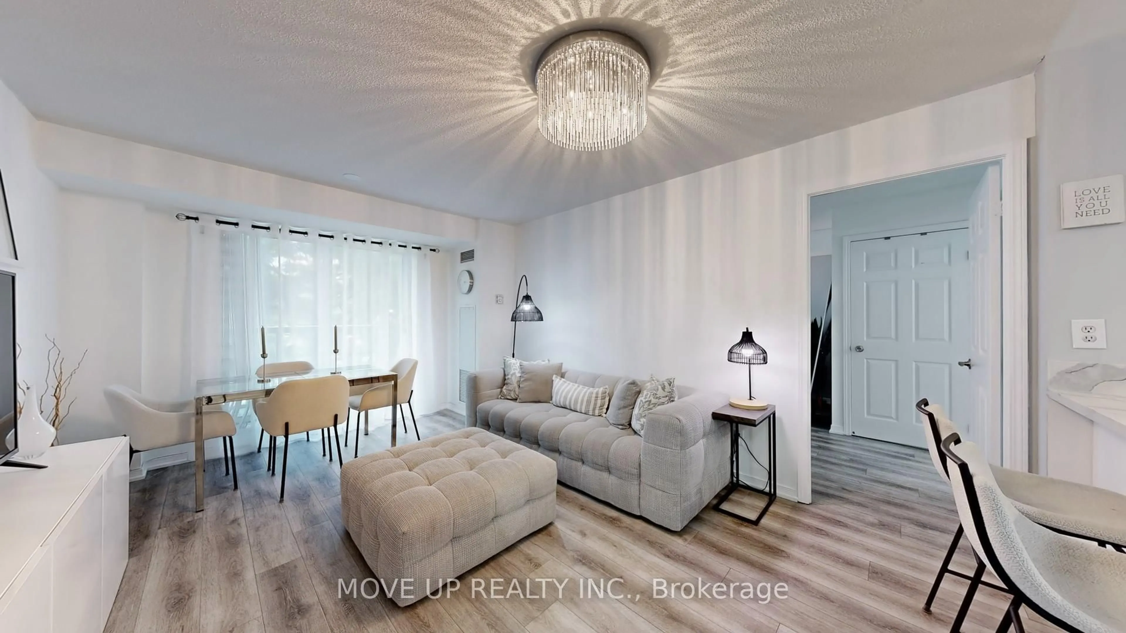 Living room with furniture, wood/laminate floor for 3 Ellesmere St #225, Richmond Hill Ontario L4B 4N2