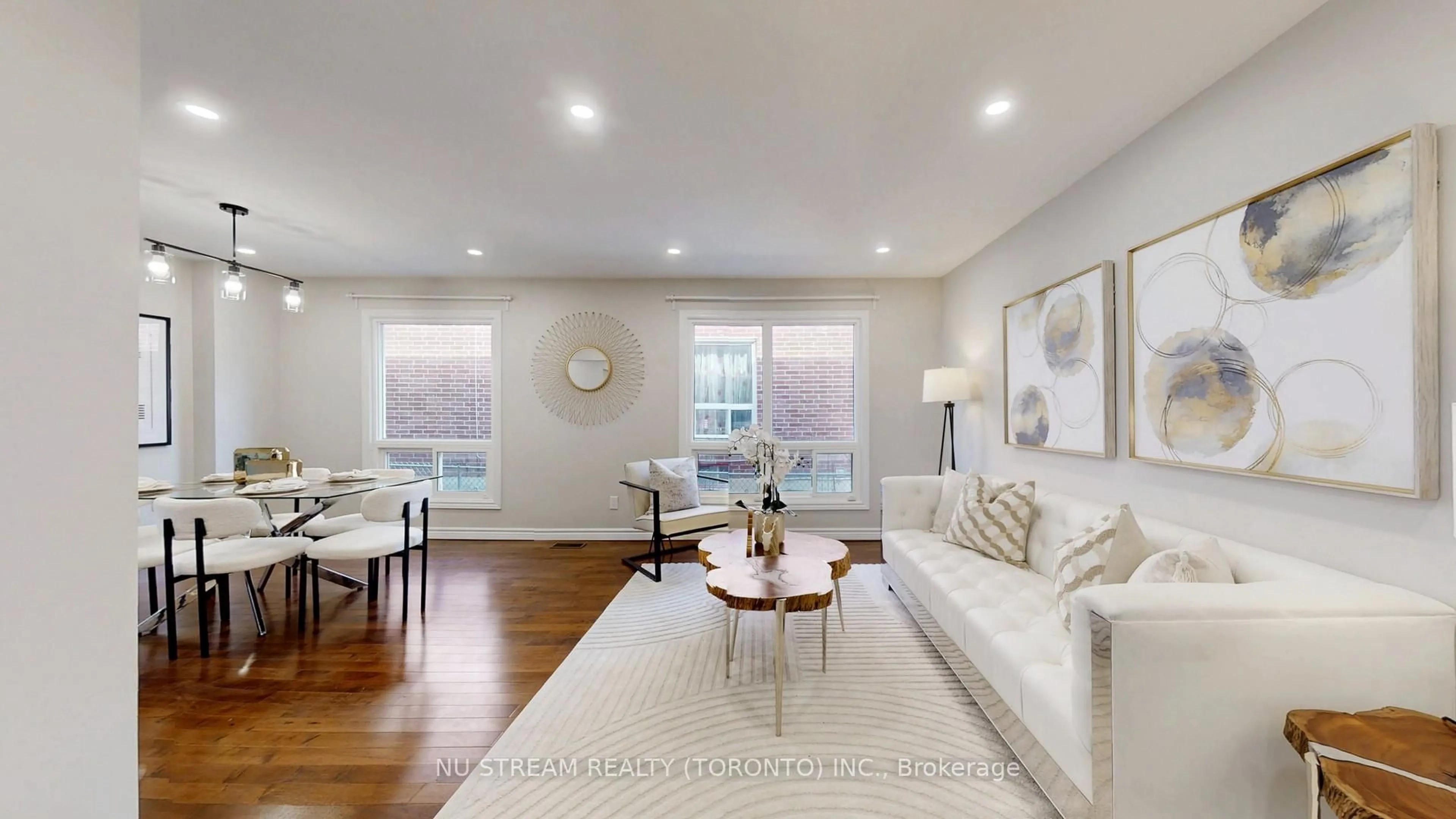 Living room with furniture, wood/laminate floor for 26 Trothen Circ, Markham Ontario L3P 4H5