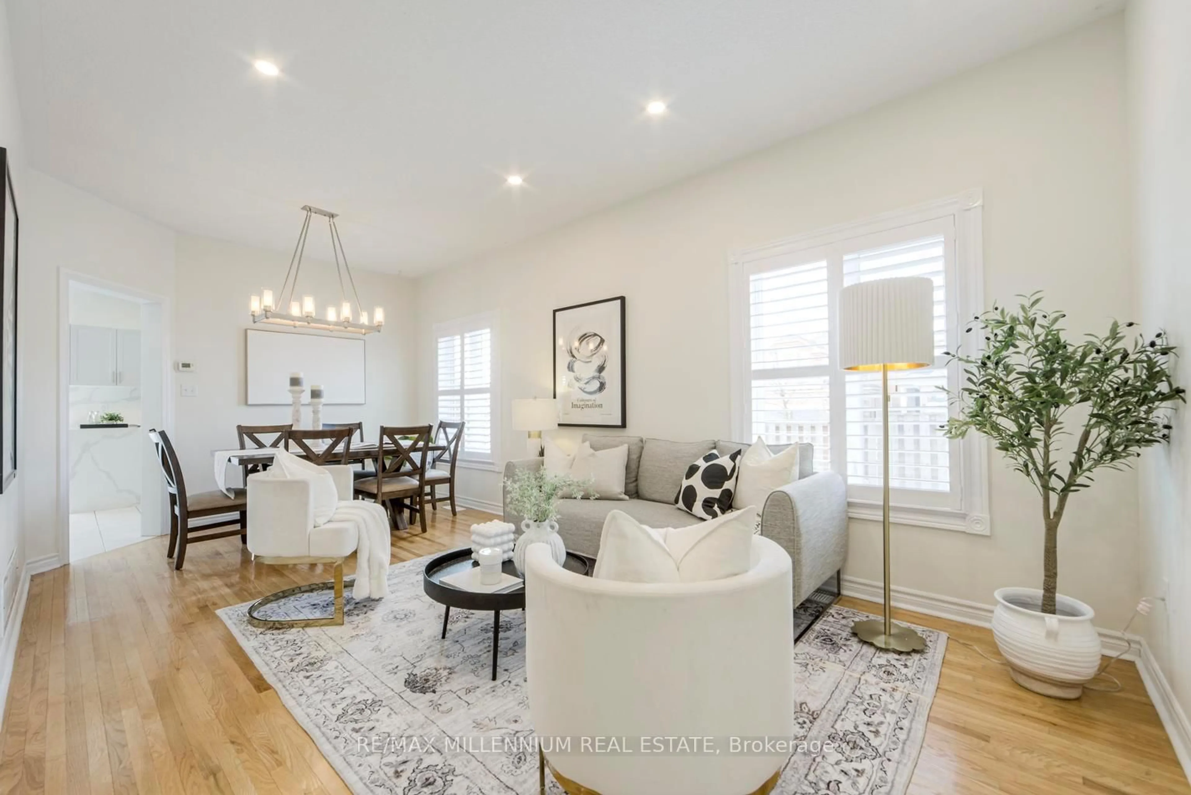 Living room with furniture, wood/laminate floor for 163 Golden Ave, Markham Ontario L3S 4E5